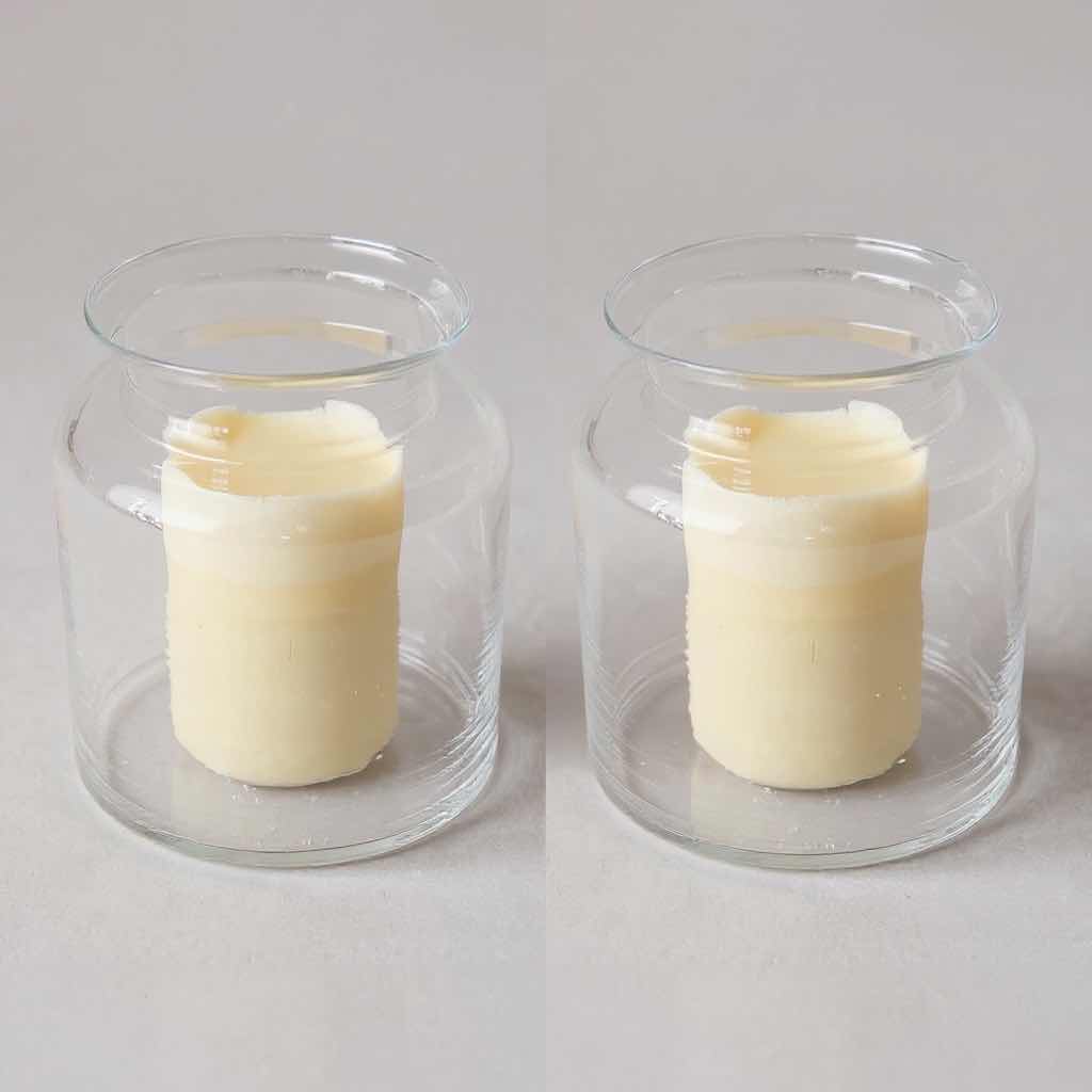 Photo 1 of 2-8” ROUND GLASS JARS W CANDLES H10”
