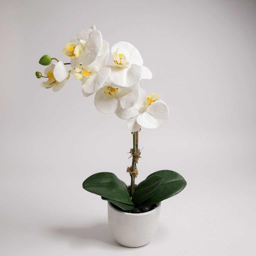 Photo 1 of FAUX ORCHID PLANT IN WHITE CONTAINER H  18"