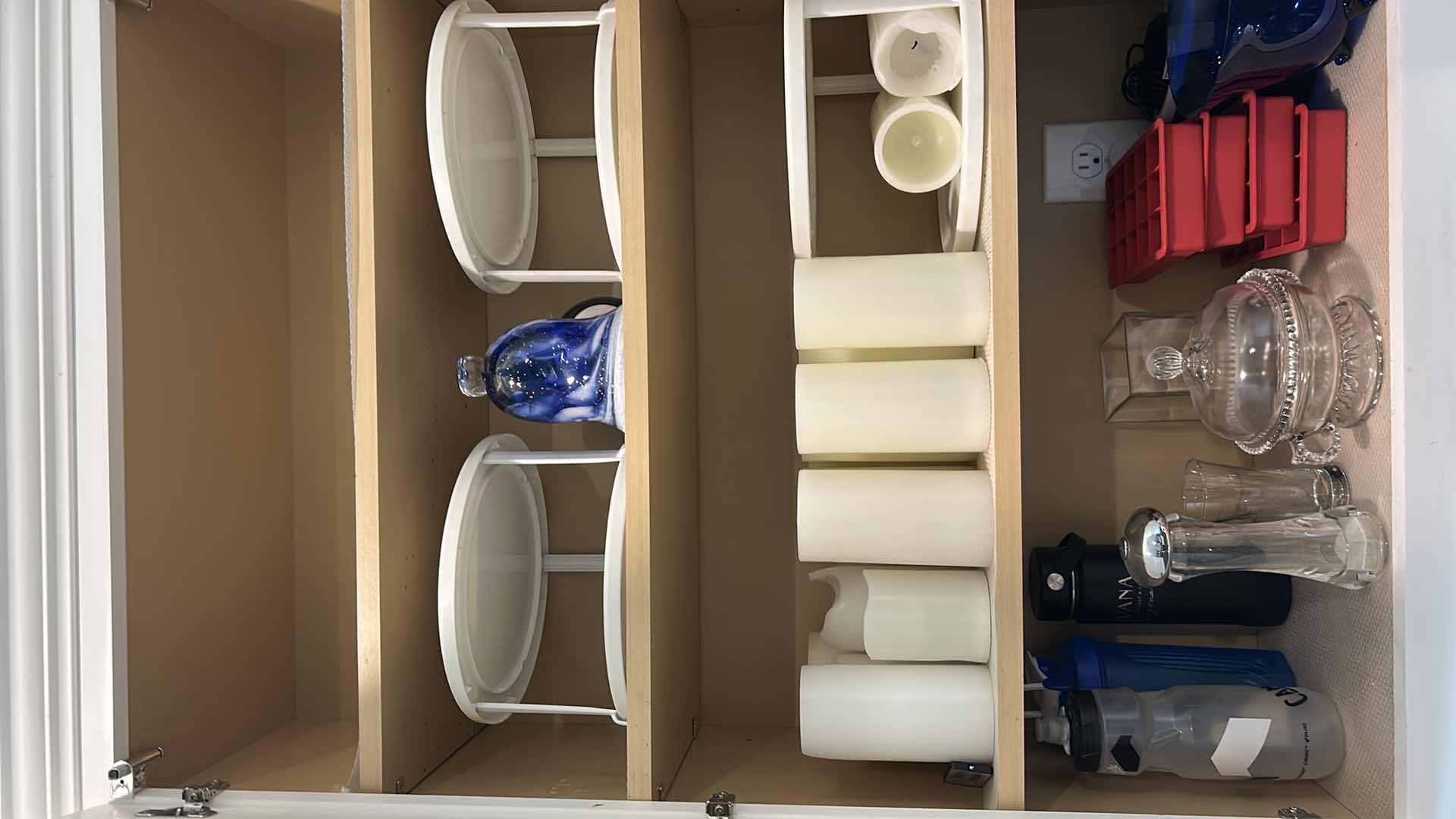Photo 1 of CONTENTS OF CABINET CANDLES KITCHEN WARE