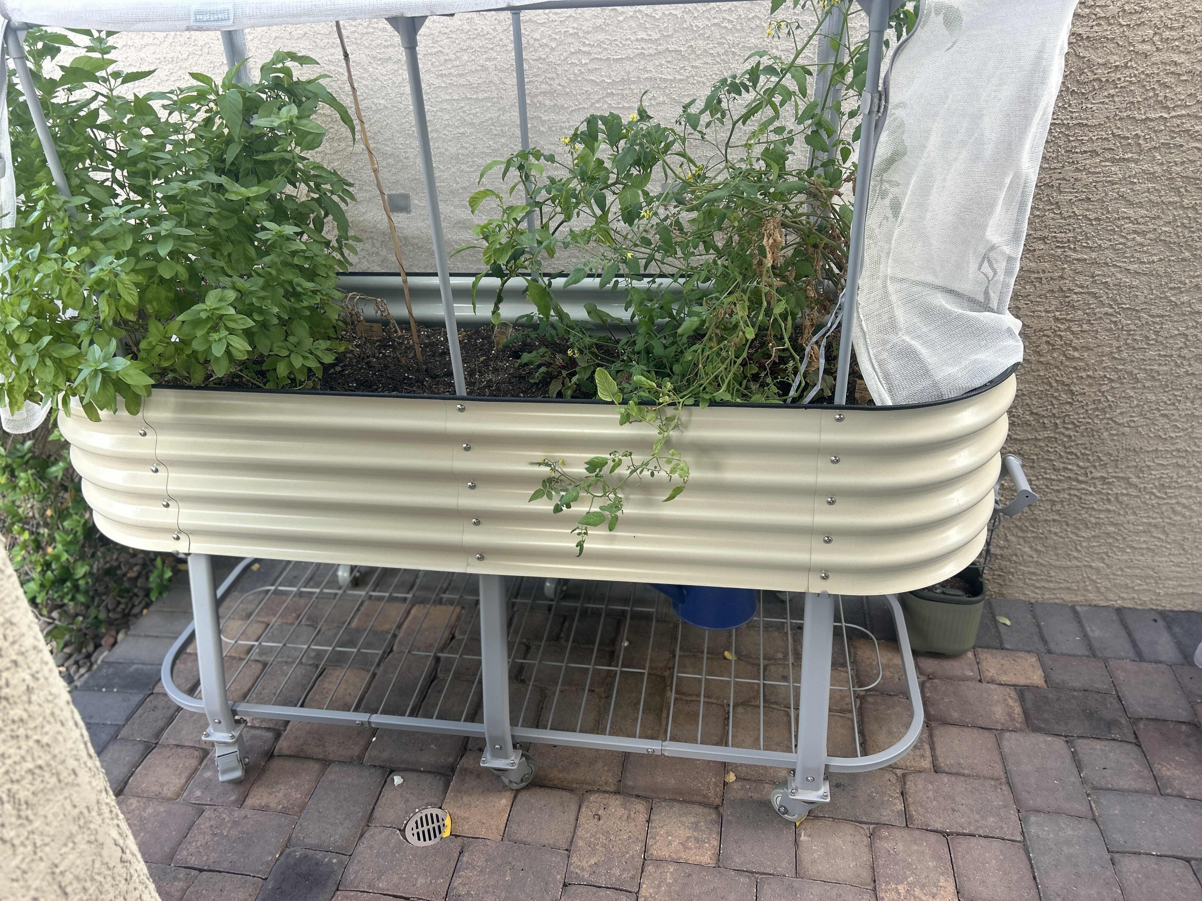 Photo 1 of VEGO GARDEN RAISED VEGETABLE GARDEN ON WHEELS WITH NETTING  2’ X 4' X H64” $350
