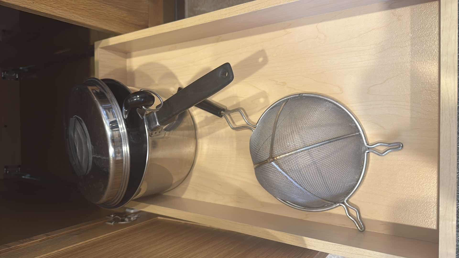 Photo 1 of CONTENTS OF KITCHEN CABINET-POTS & PANS