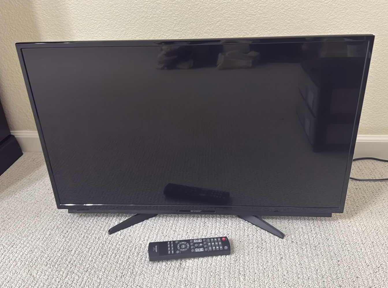 Photo 1 of 32” SHARP FLAT SCREEN TV W REMOTE