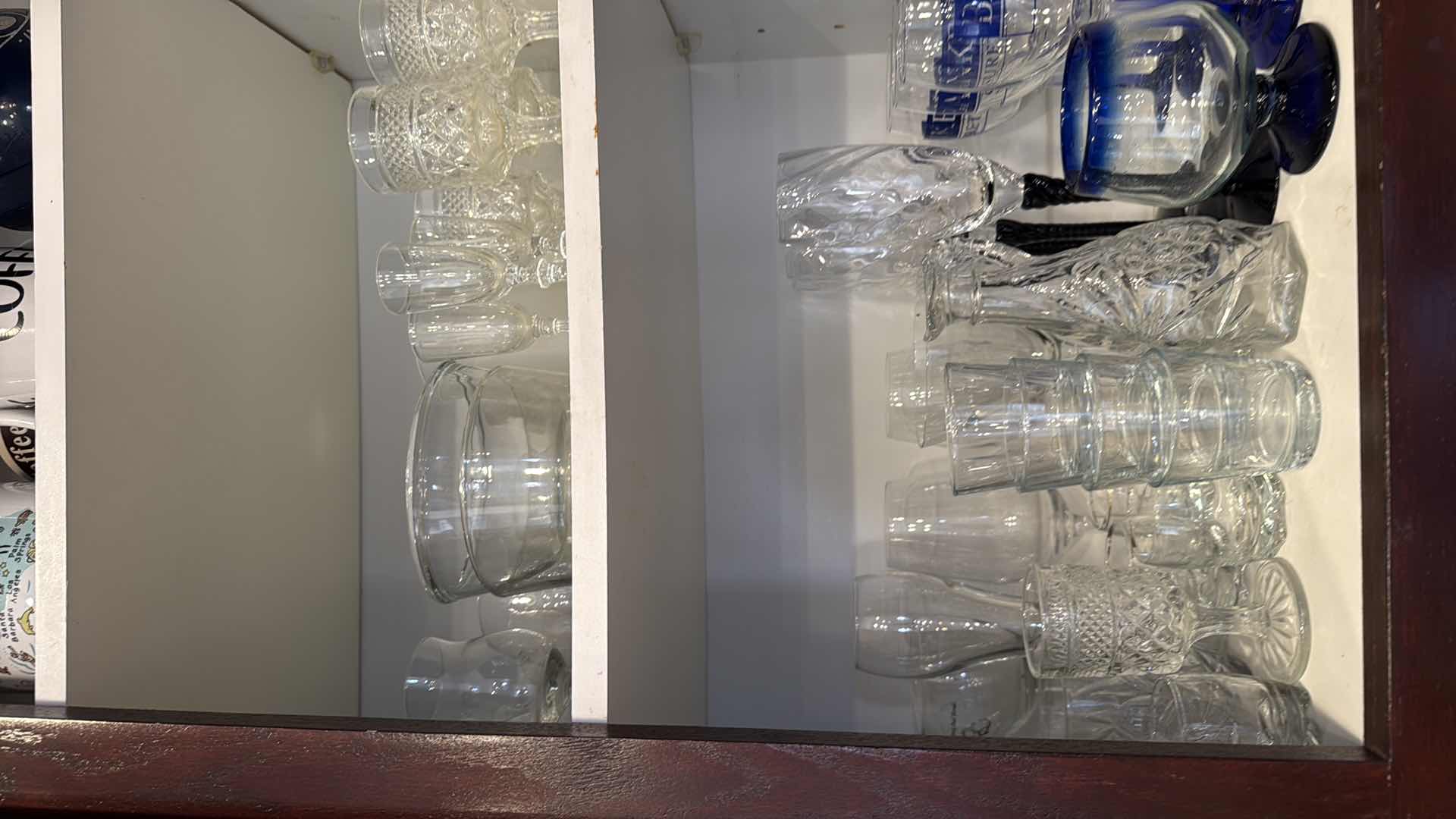 Photo 1 of CONTENTS OF KITCHEN CABINET-GLASSWARE & CUPS