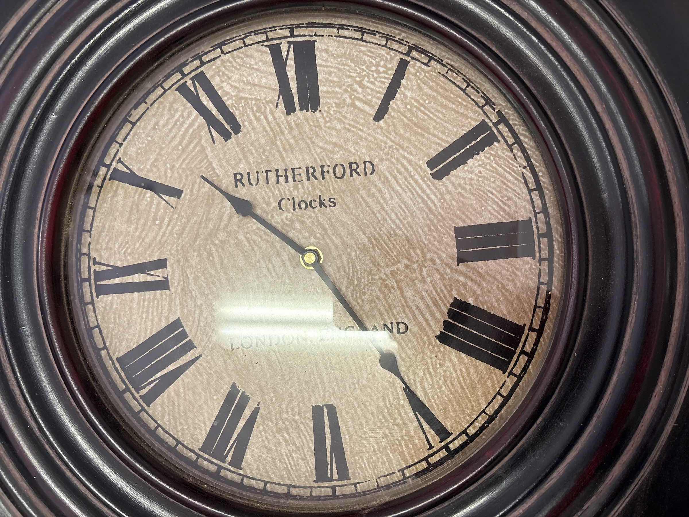 Photo 1 of RUTHERFORD WALL CLOCK 23.5”