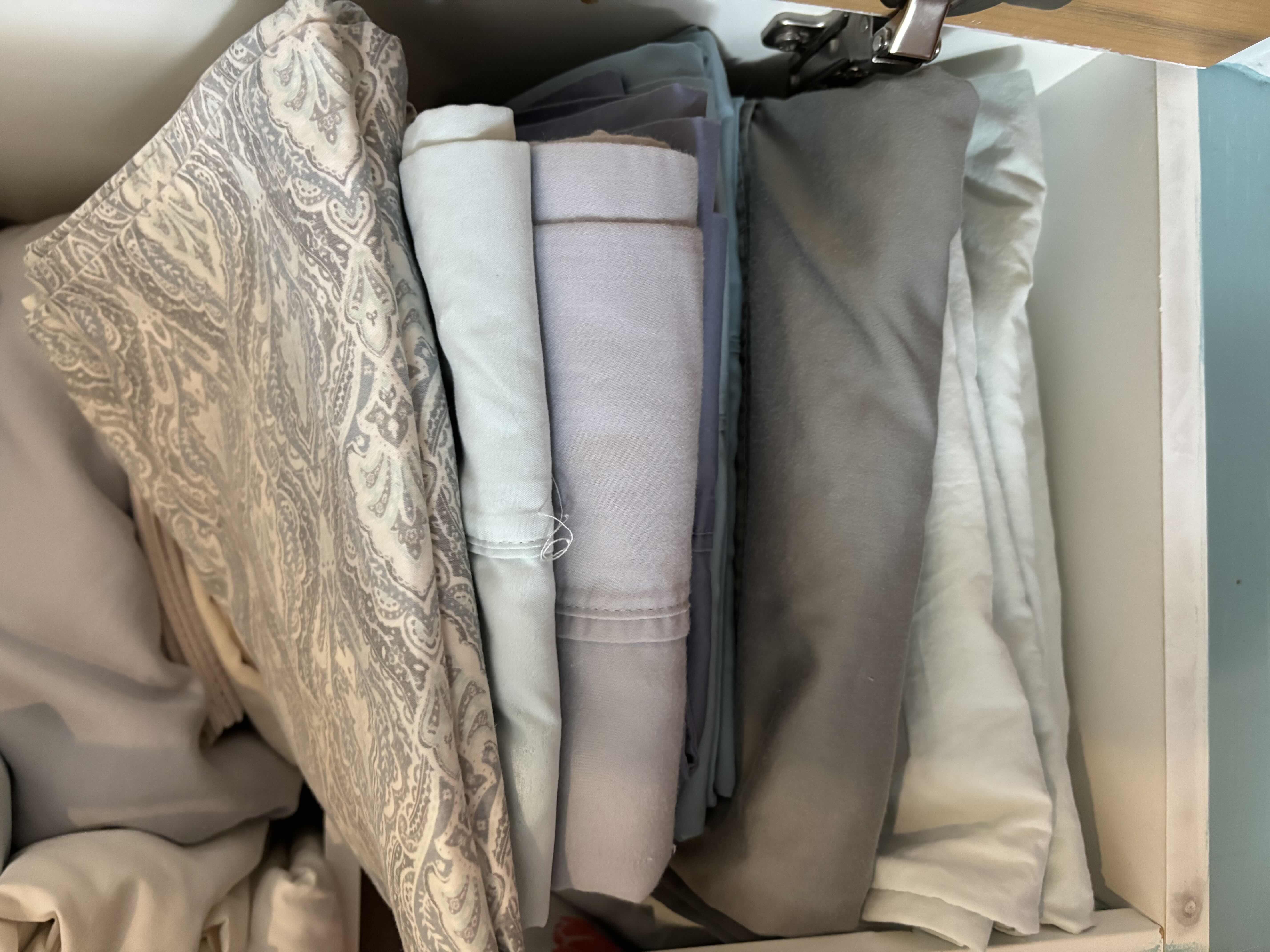 Photo 1 of CONTENTS OF LINEN CABINET & COUNTER (QUEEN SIZE BED LINENS)