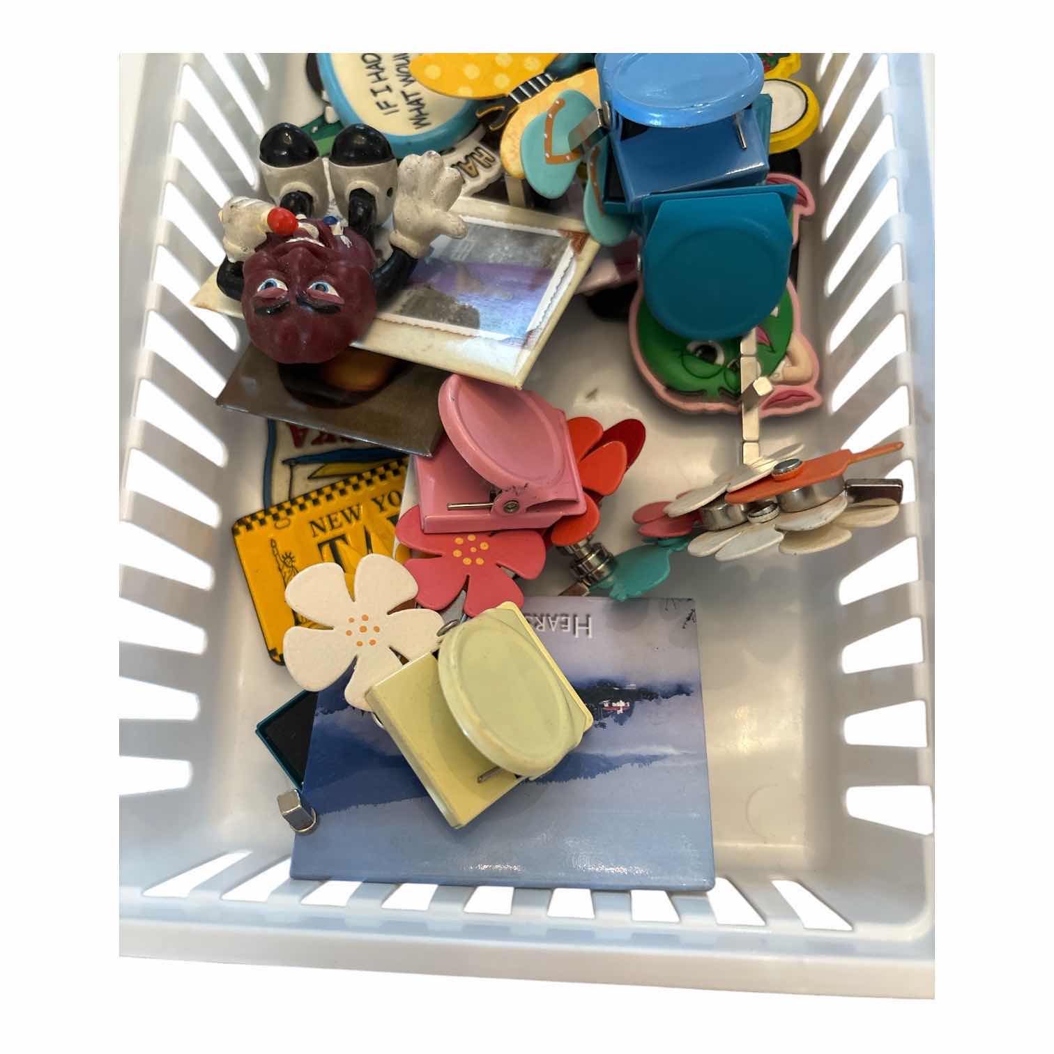 Photo 1 of SMALL CONTAINER OF COLORFUL MAGNETS AND CLIPS