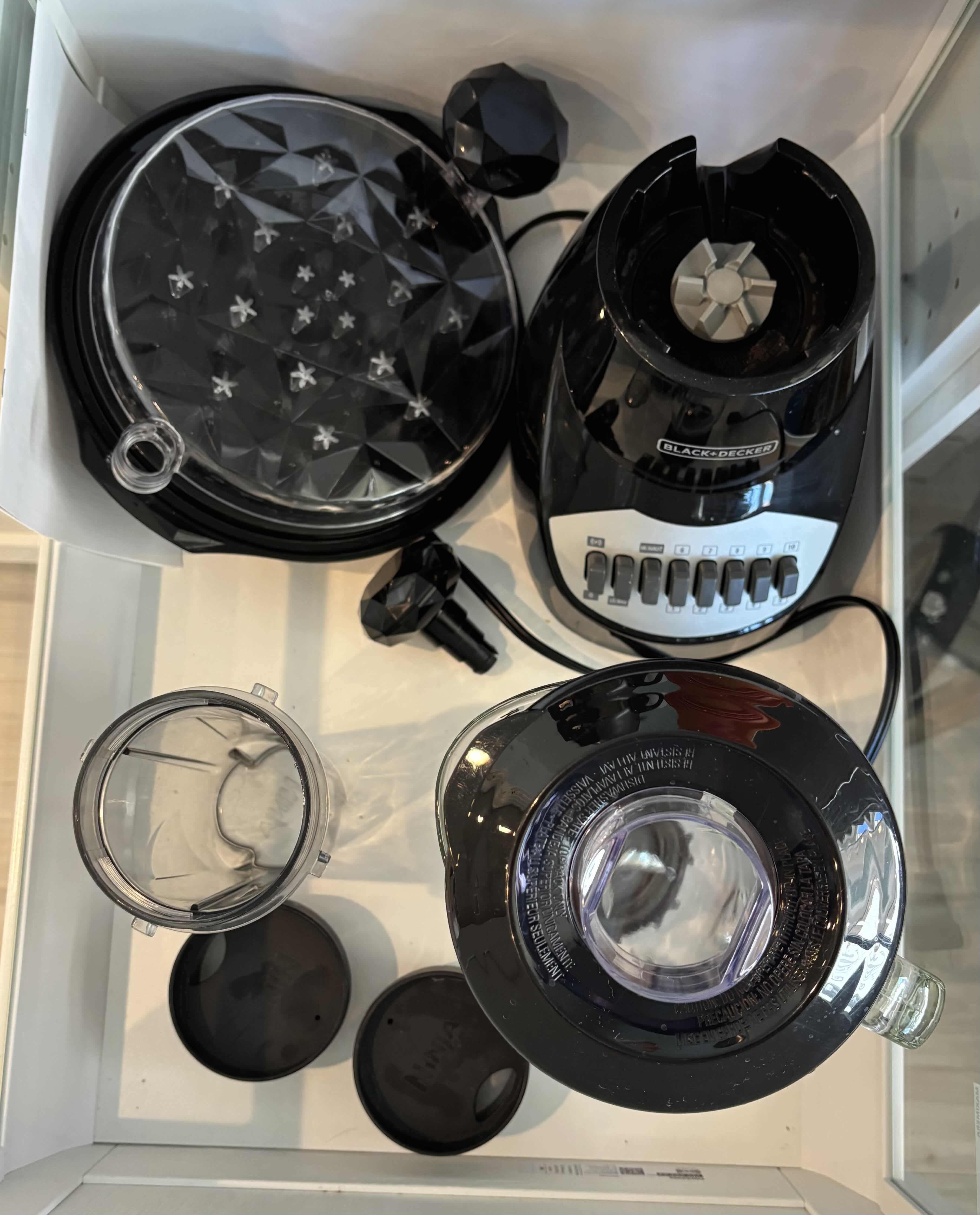 Photo 1 of CONTENTS OF KITCHEN DRAWER: BLENDER & MEAT SHREDDER