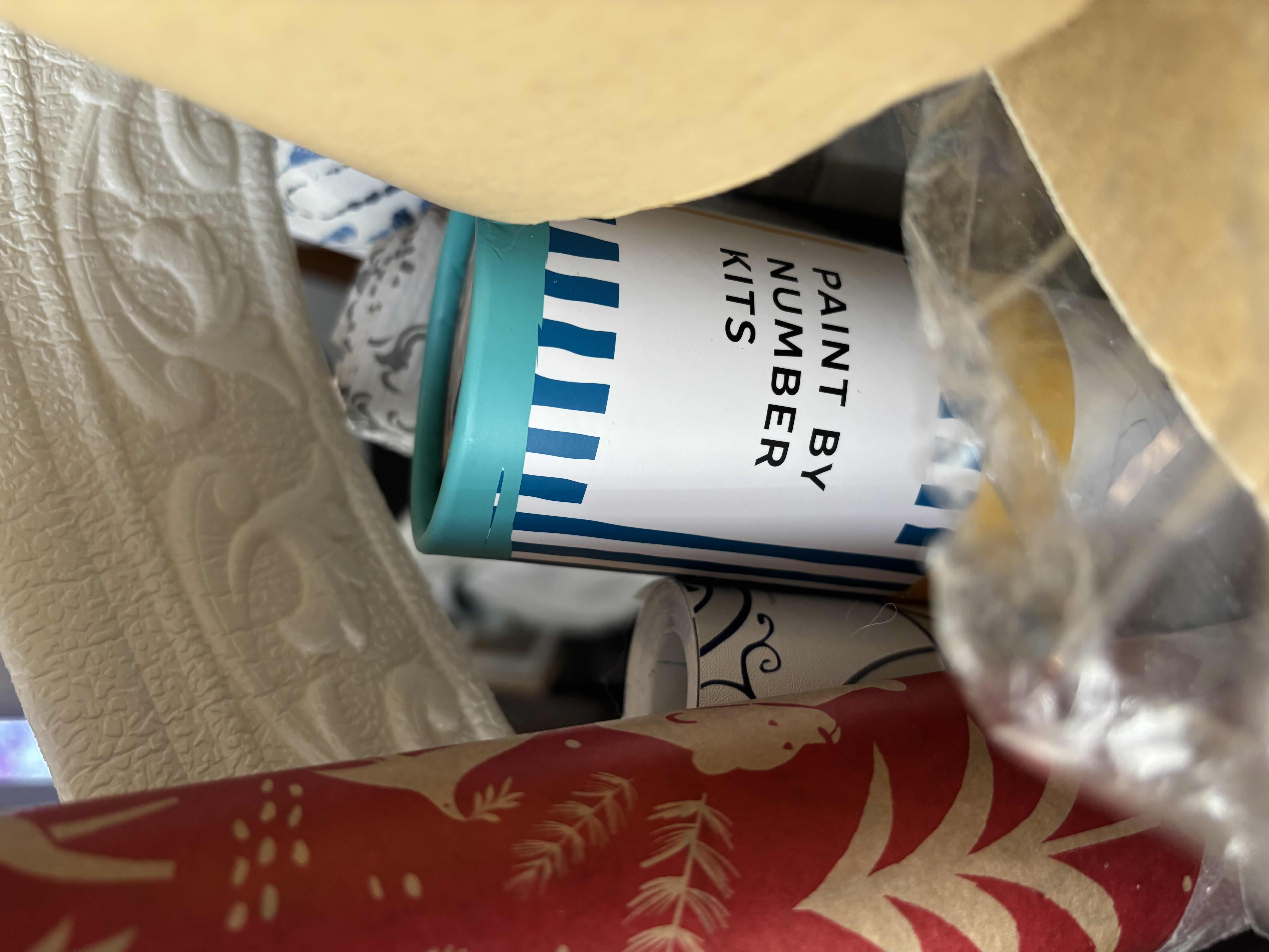 Photo 1 of BOX OF SELF ADHESIVE CORNER MOLDING, WRAPPING PAPER & WALL PAPER