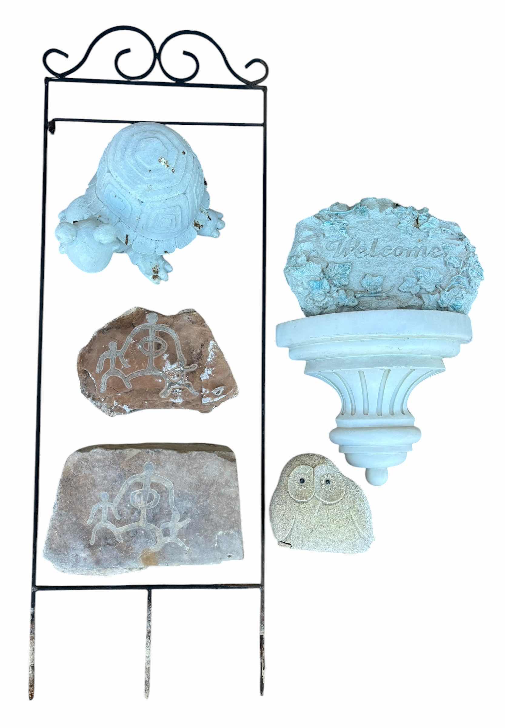 Photo 1 of OUTDOOR DECOR: FLAG HOLDER STAND, STATUE, WALL SHELF WITH ATTACHED WELCOME SIGN, HIEROGLYPHICS ROCKS (ORIGIN UNKNOWN) & HIDE-A-KEY OWL FIGURINE