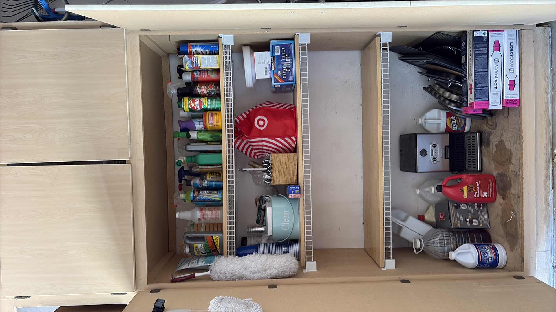 Photo 1 of SHELVES OF CLEANING SUPPLIES , PLASTIC CUTLERY AND BAKING DISHES