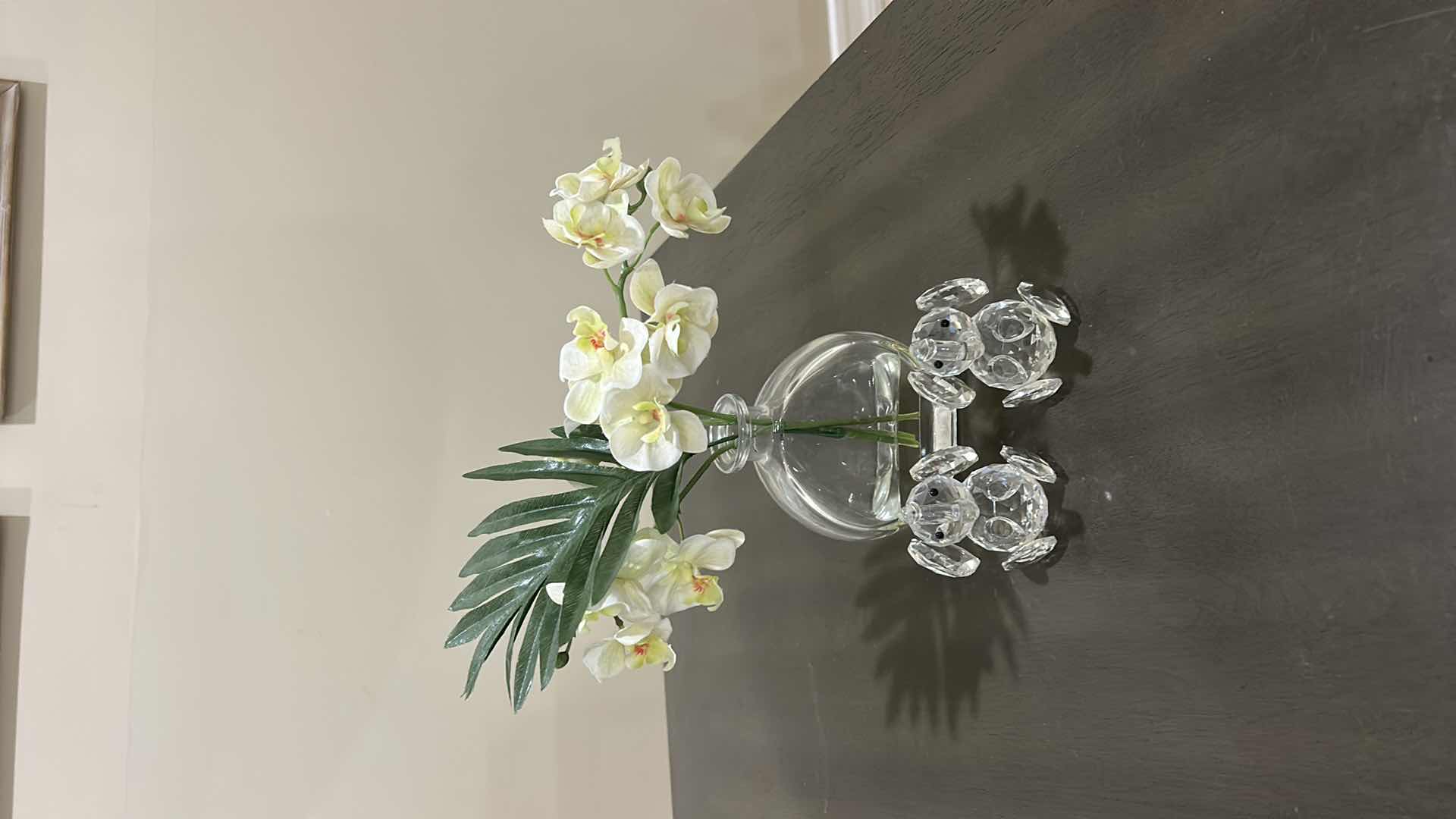 Photo 1 of AMLONG CRYSTAL SITTING ELEPHANT FIGURINES, H3.5” & FAUX FLORAL ARRANGEMENT