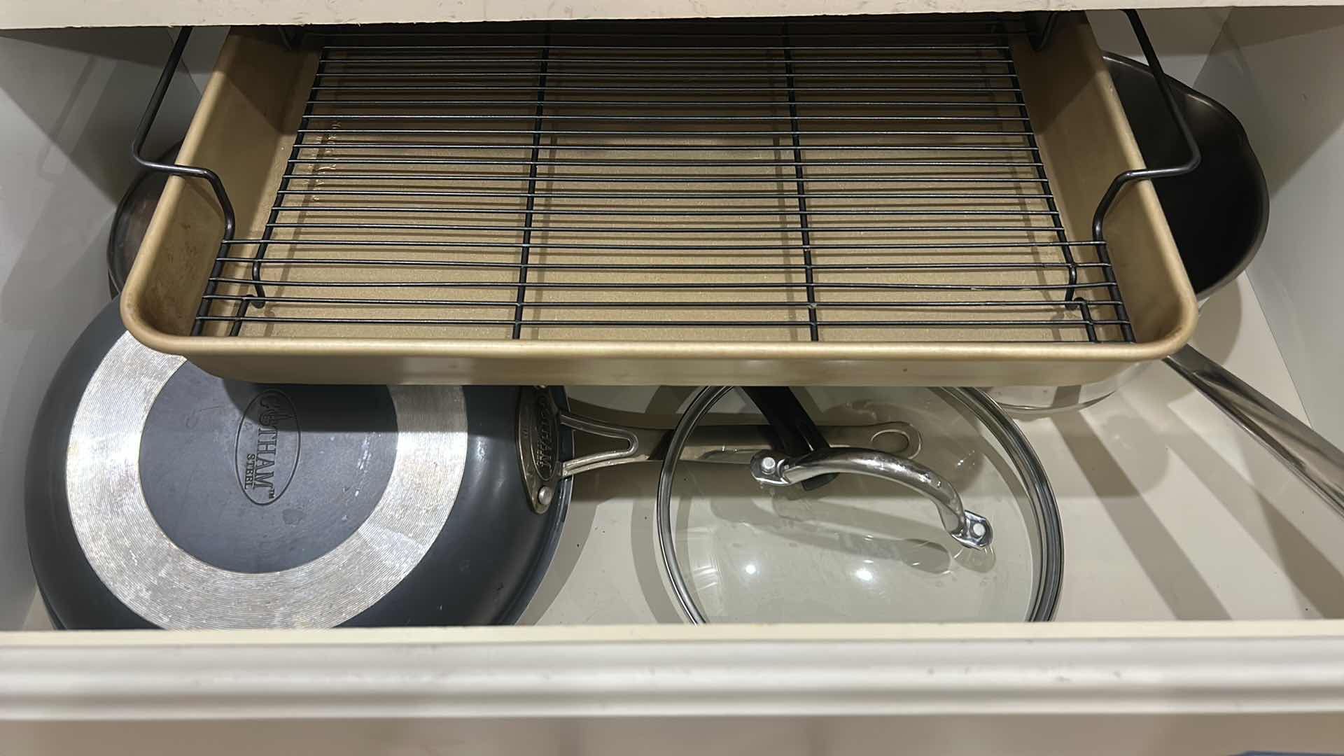 Photo 1 of DRAWER, FULL OF CUISINART POTS AND PANS WITH LIDS