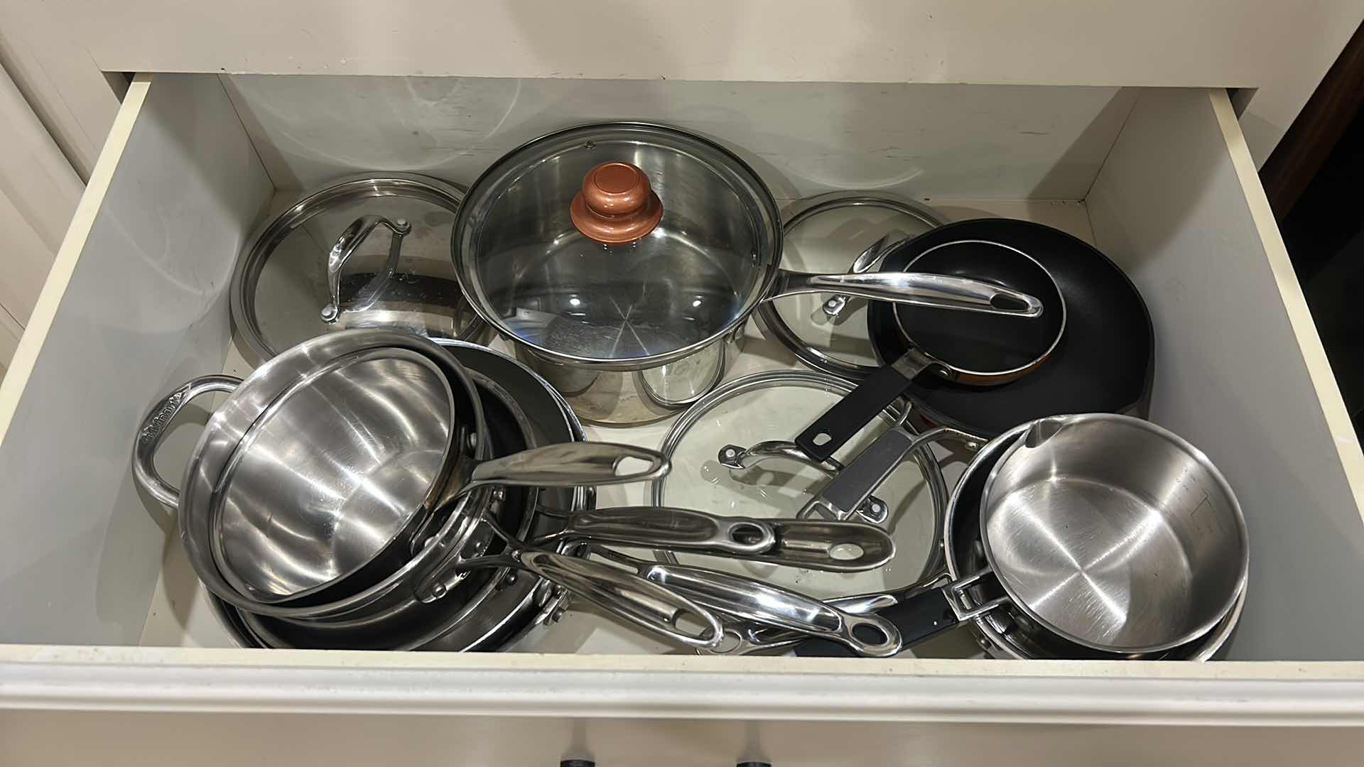 Photo 1 of DRAWER, FULL OF CUISINART POTS AND PANS WITH LIDS