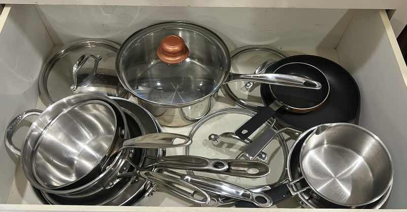 Photo 1 of DRAWER, FULL OF CUISINART POTS AND PANS WITH LIDS