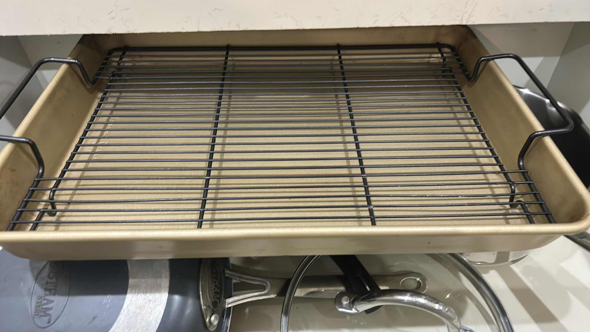 Photo 1 of DRAWER, FULL OF CUISINART POTS AND PANS WITH LIDS