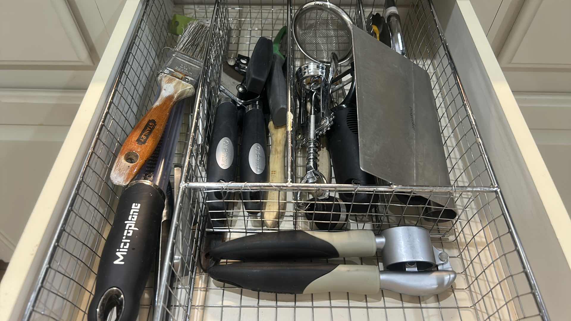 Photo 1 of CONTENTS OF DRAWER IN KITCHEN CAN OPENER BOTTLE OPENERS CHEESE, GRATER, AND