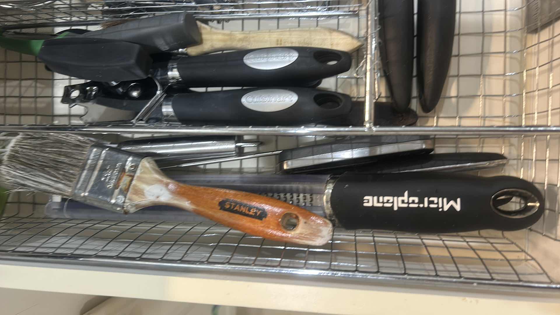 Photo 1 of CONTENTS OF DRAWER IN KITCHEN CAN OPENER BOTTLE OPENERS CHEESE, GRATER, AND