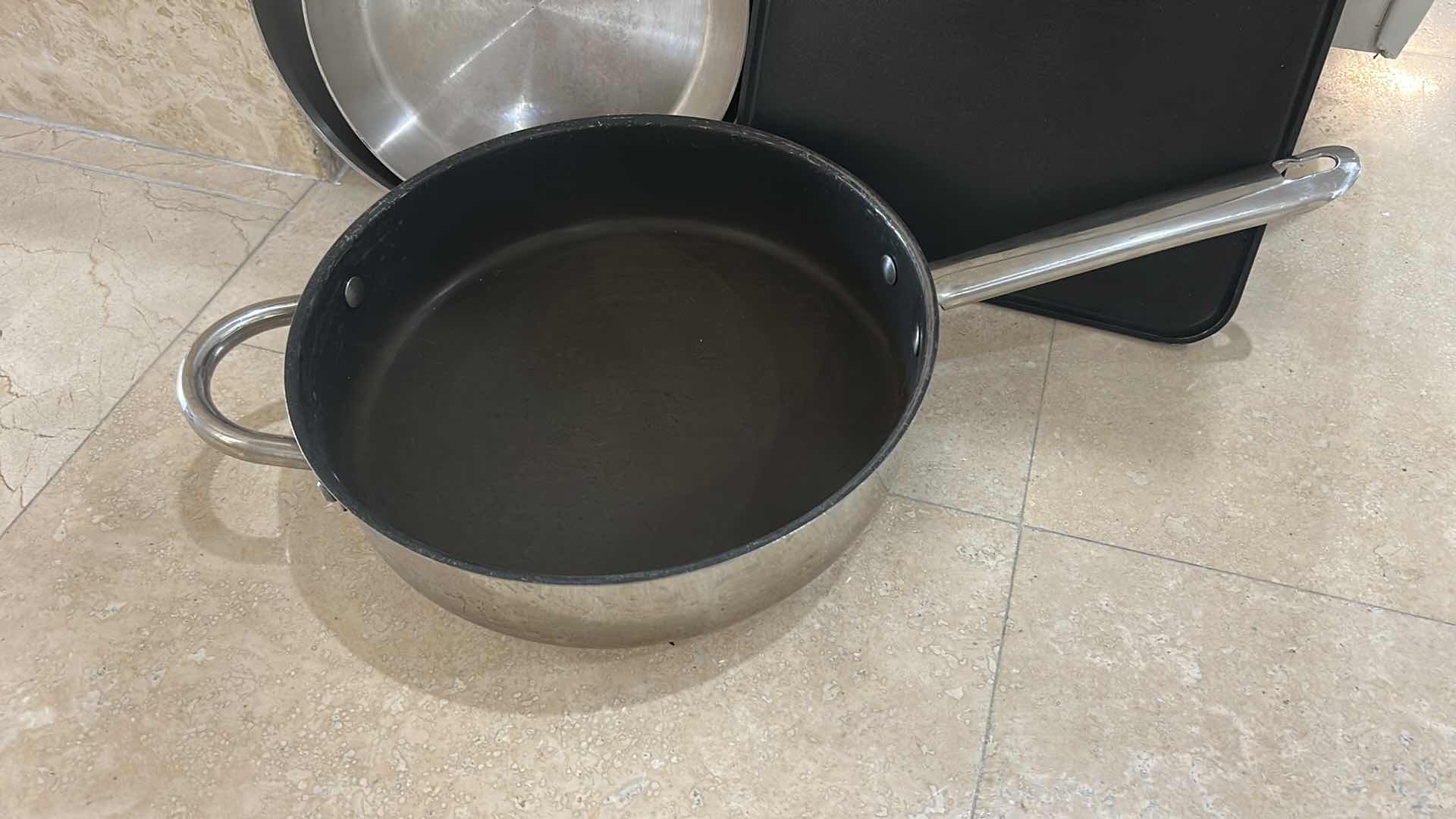 Photo 1 of THREE ALL CLAD SKILLETS AND ONE WOLFGANG PUCK