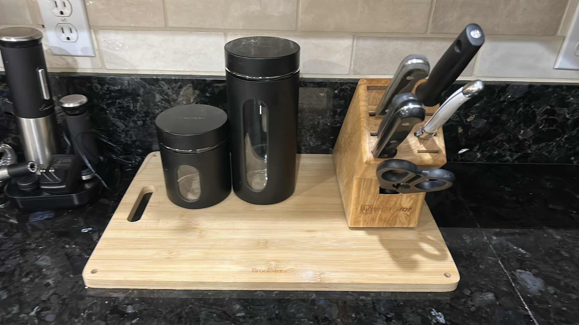 Photo 1 of CUTTING BOARD, CANISTERS, KNIFE, BLOCK, AND MORE