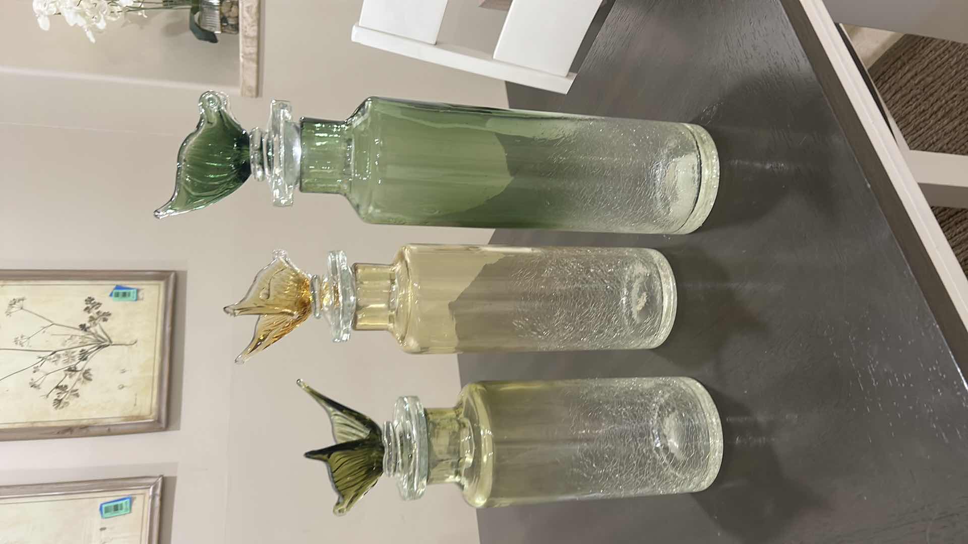 Photo 1 of 3 DECORATIVE BOTTLES FEATURE UNIQUE BUTTERFLY GLASS STOPPERS. (TALLEST H17.5”)