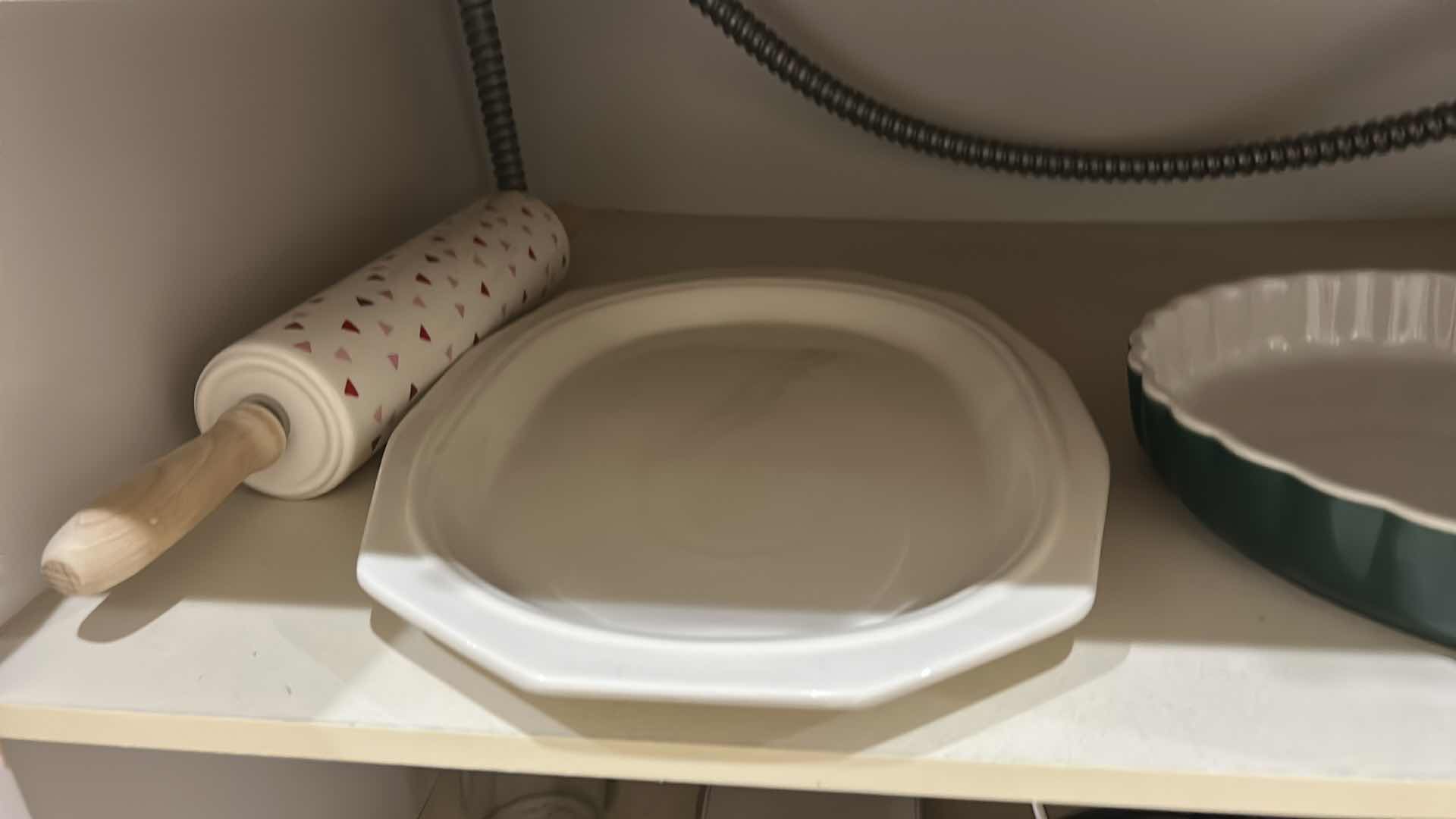 Photo 1 of CONTENTS OF KITCHEN CABINET, MEASURING ITEMS, SERVINGWARE, TEAPOT, AND MORE