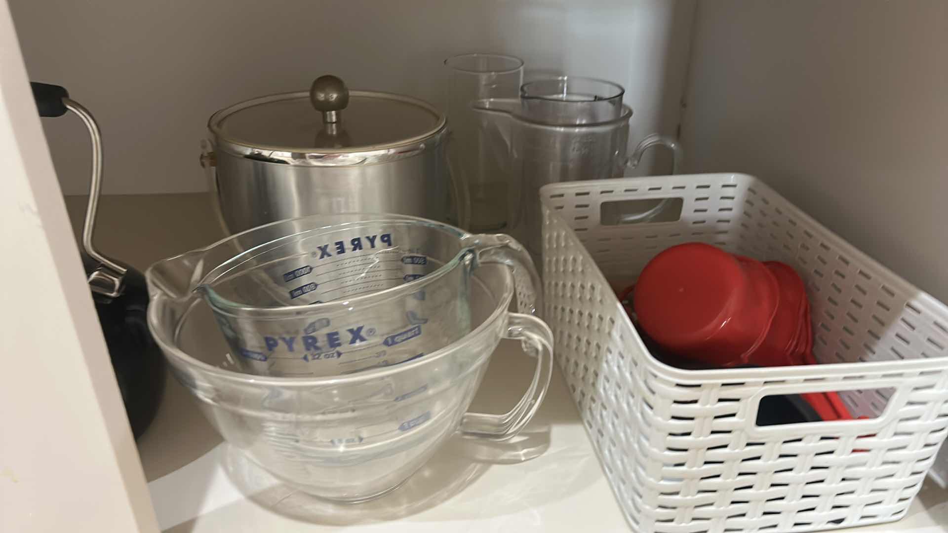 Photo 1 of CONTENTS OF KITCHEN CABINET, MEASURING ITEMS, SERVINGWARE, TEAPOT, AND MORE
