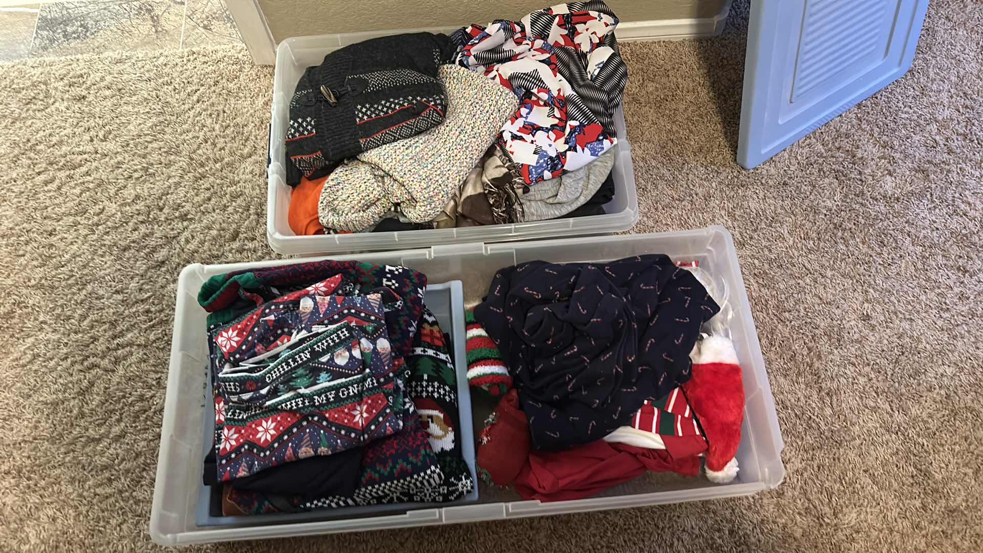 Photo 1 of 2 BINS OF CLOTHING