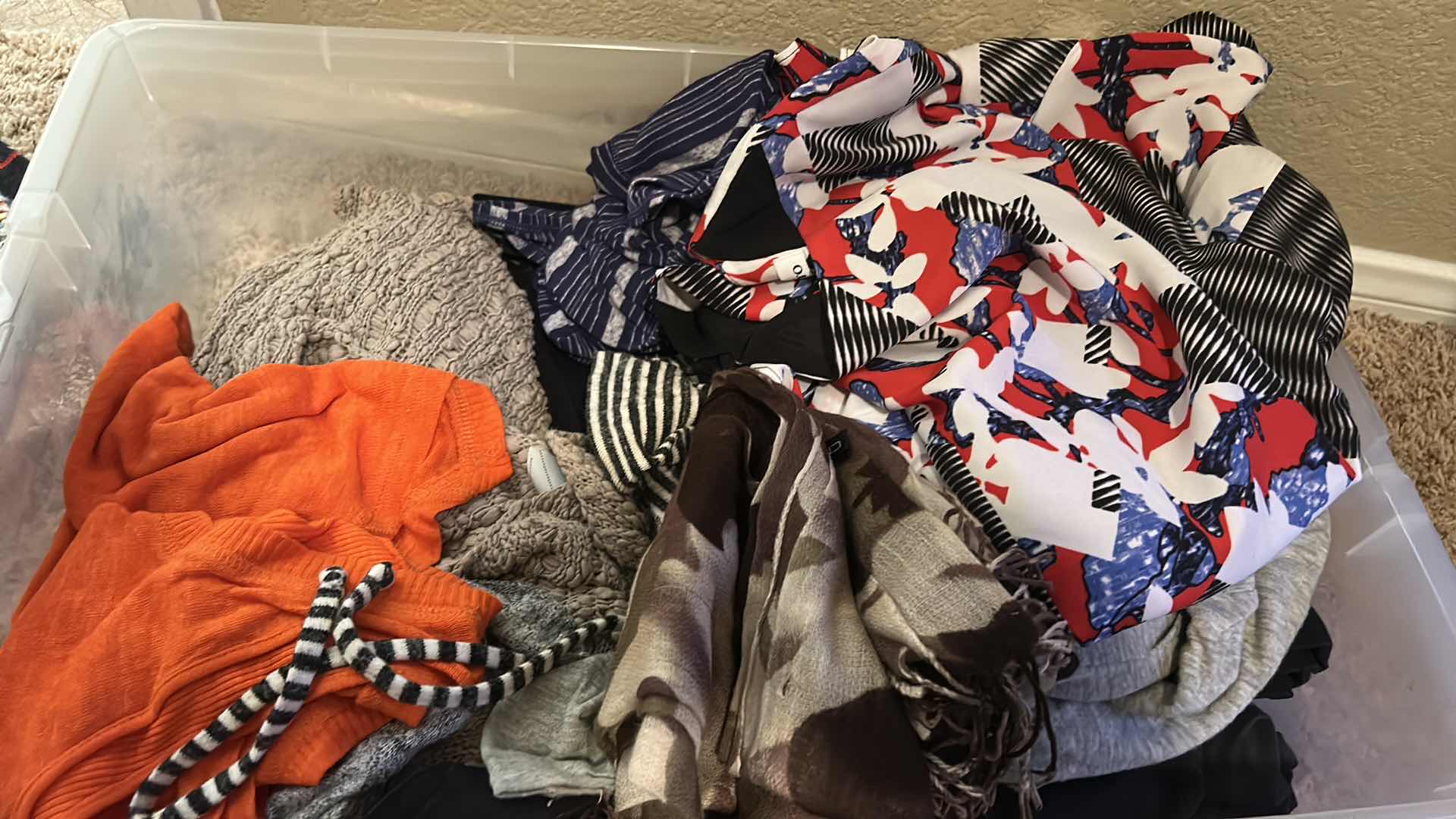 Photo 1 of 2 BINS OF CLOTHING