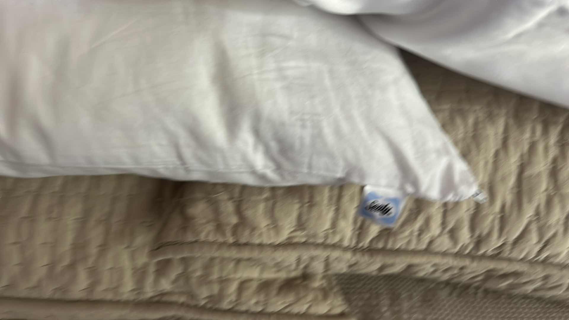 Photo 1 of DARK WOOD PLATFORM BED FEATURING A SLEIGH-STYLE HEADBOARD, MATCHING FOOTBOARD, AND NEUTRAL QUILTED BEDDING WITH ACCENT PILLOWS. INCLUDES SERTA QUEEN MATTRESS. (MATTRESS MEASURES 5 FEET X 81”  INCHES HEADBOARD HEIGHT 52 1/2 INCHES)