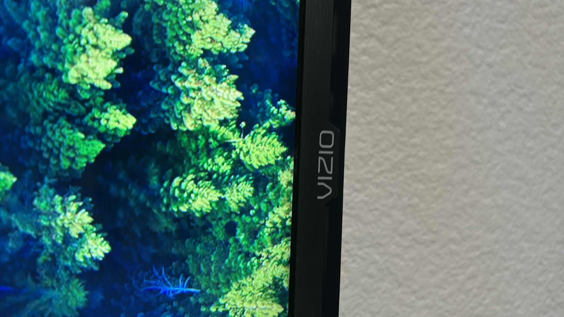 Photo 1 of 55" VIZIO SMART TV W SLEEK THIN BEZEL WALL MOUNT DESIGN