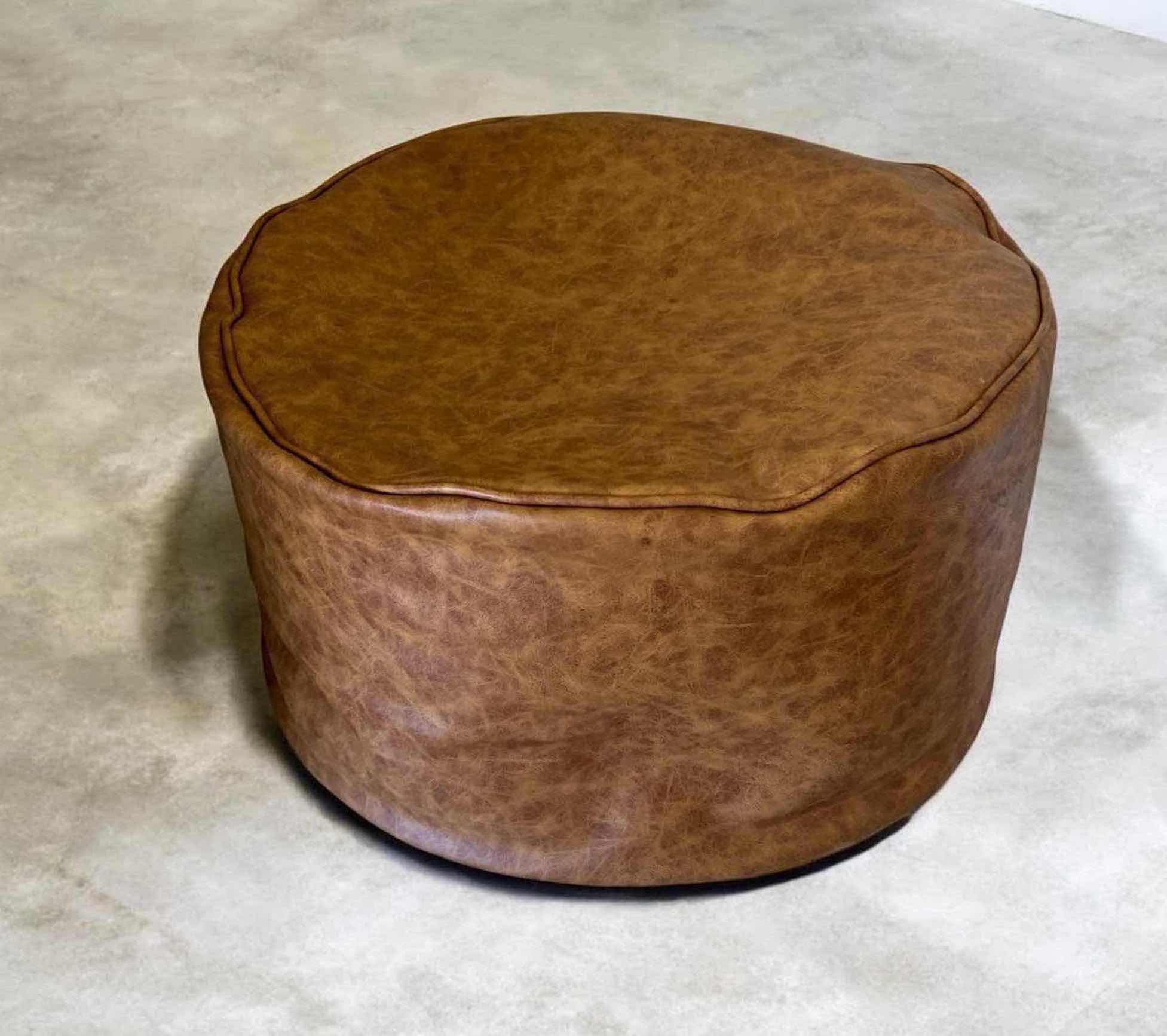 Photo 1 of MOCHA FAUX LEATHER POUF 24" X 12"