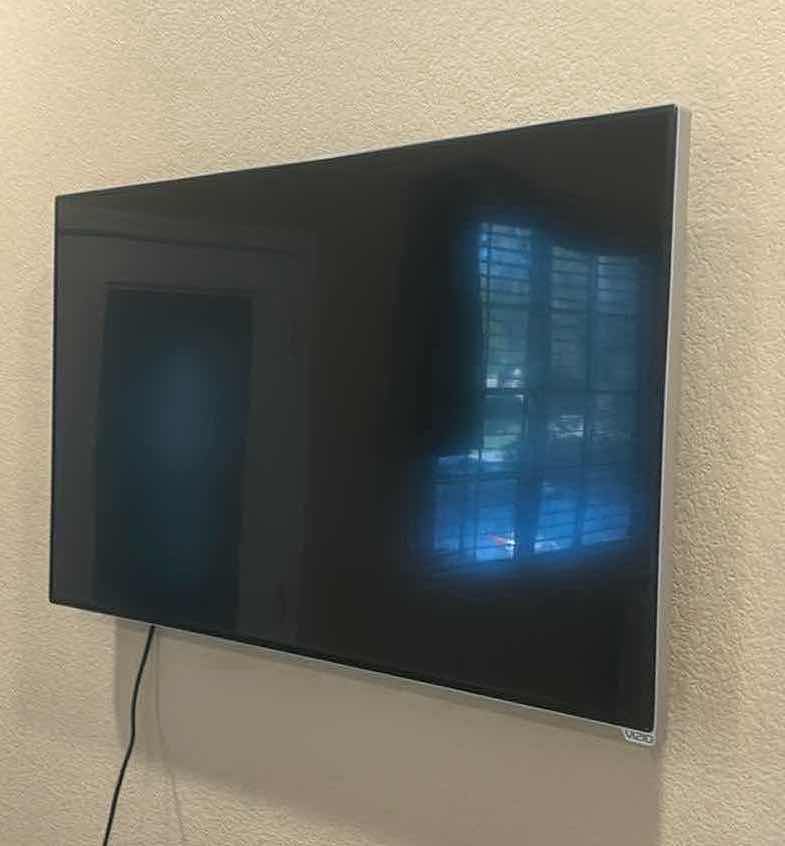Photo 1 of VIZIO WALL MOUNT 43” TV