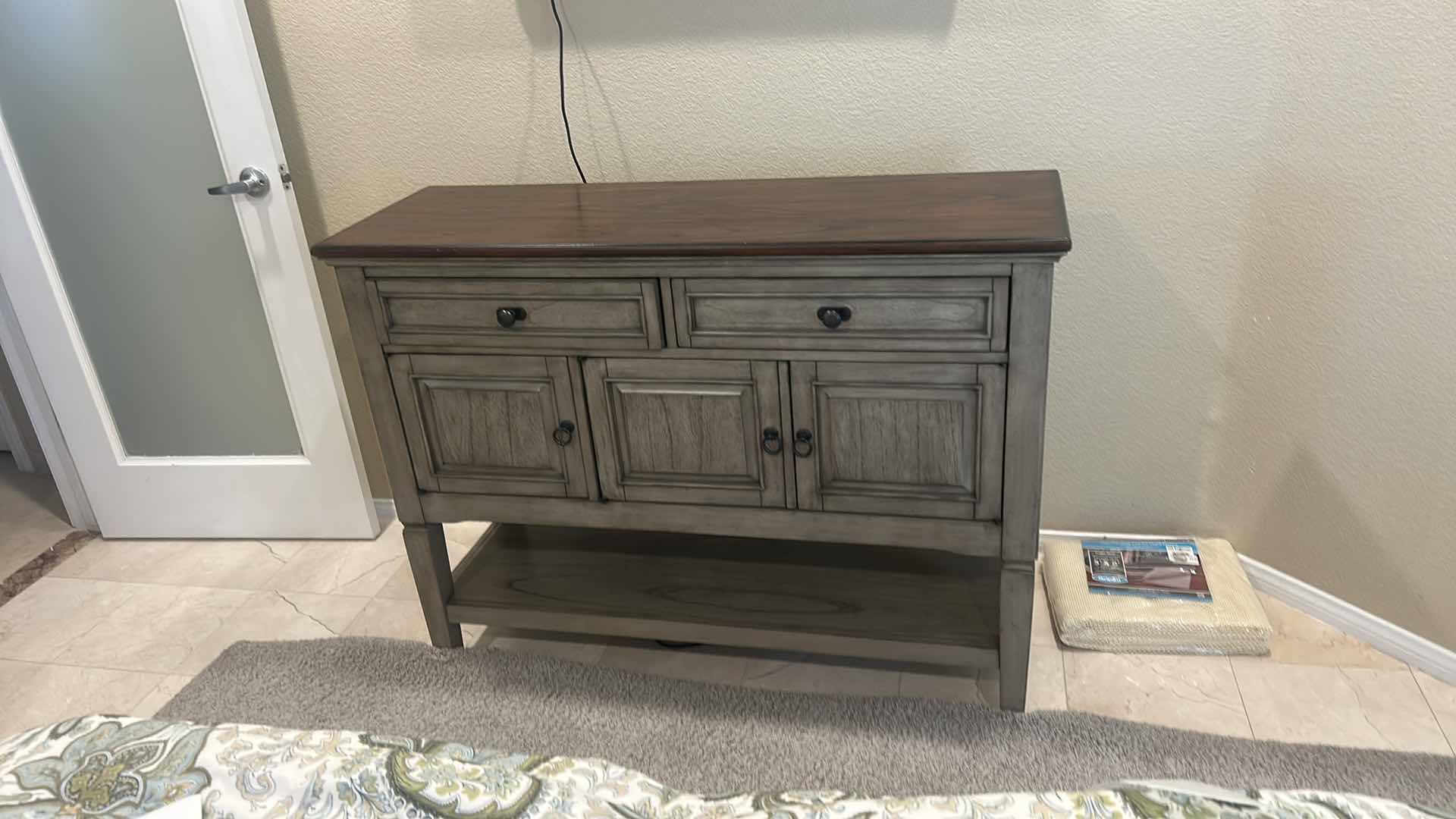 Photo 1 of PIKE & MAIN COLLIN 47” ACCENT CONSOLE FEATURES A DISTRESSED GRAY BASE WITH A DARK WOOD TOP. 47 x 16“ x H36“ $279