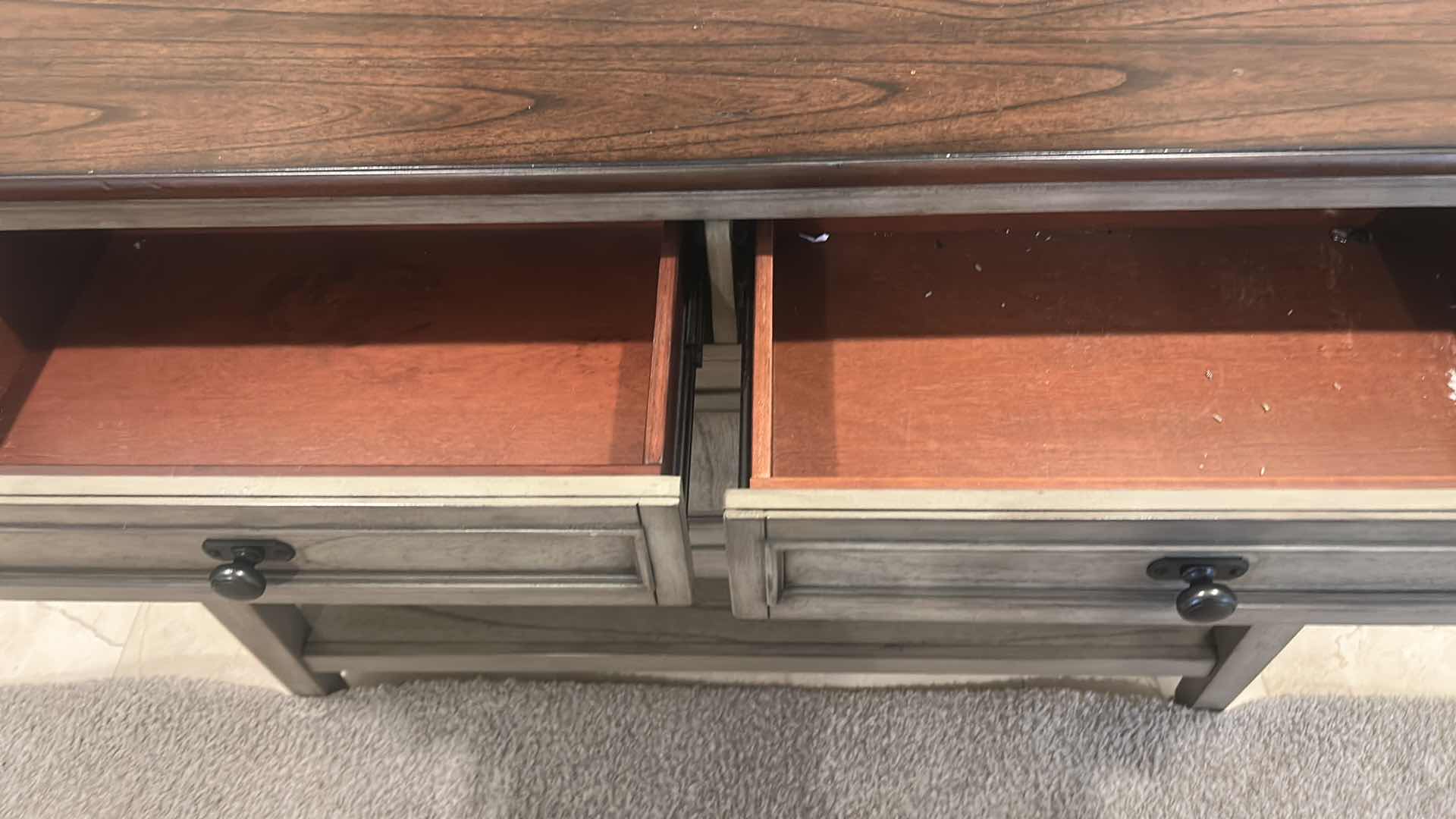 Photo 1 of PIKE & MAIN COLLIN 47” ACCENT CONSOLE FEATURES A DISTRESSED GRAY BASE WITH A DARK WOOD TOP. 47 x 16“ x H36“ $279