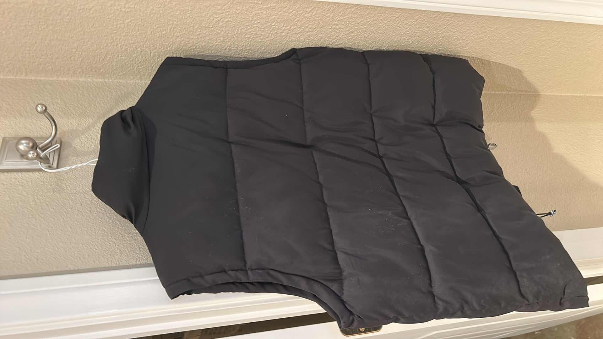 Photo 1 of TWO WOMEN’S PUFFER JACKETS SIZE SMALL