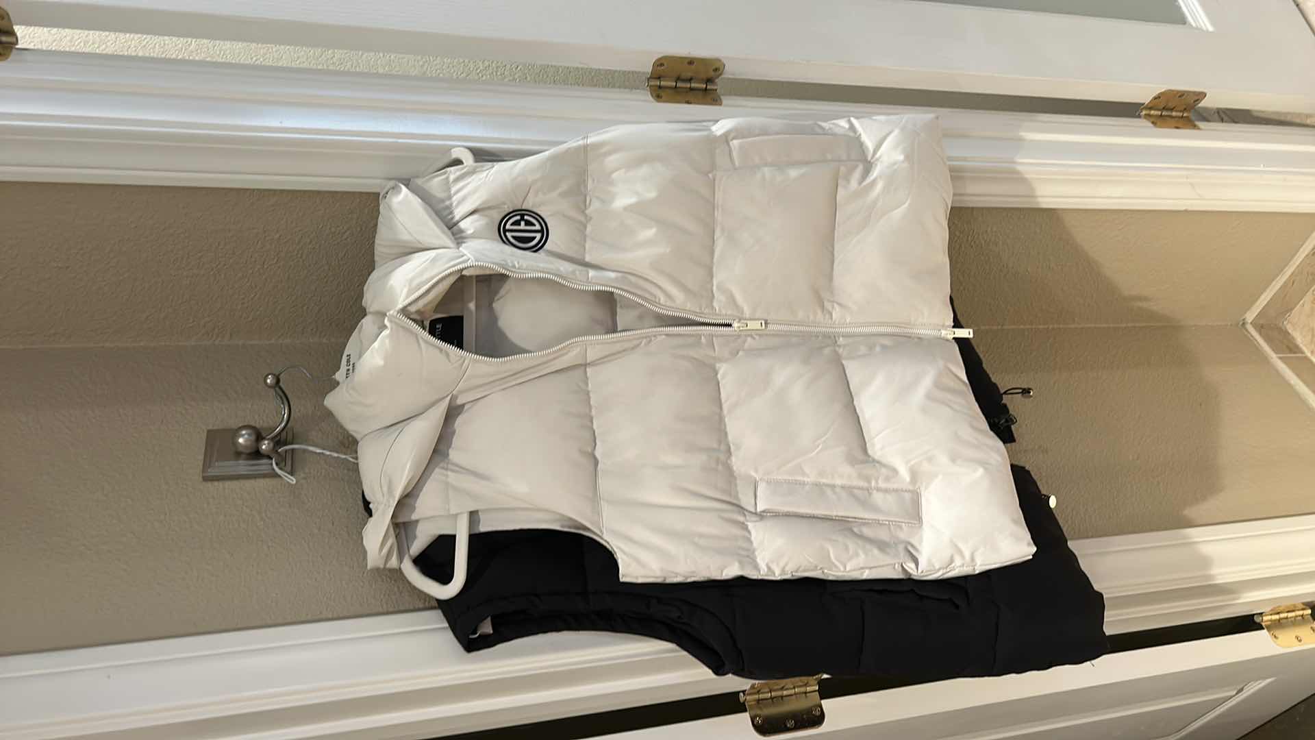 Photo 1 of TWO WOMEN’S PUFFER JACKETS SIZE SMALL