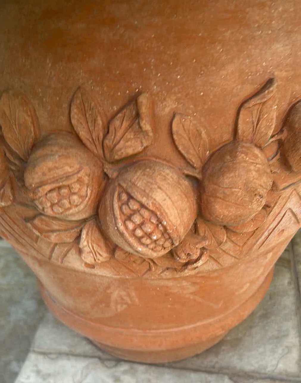 Photo 1 of ARTIFICIAL BOSTON FERN IN A CARVED TERRACOTTA URN H 43"