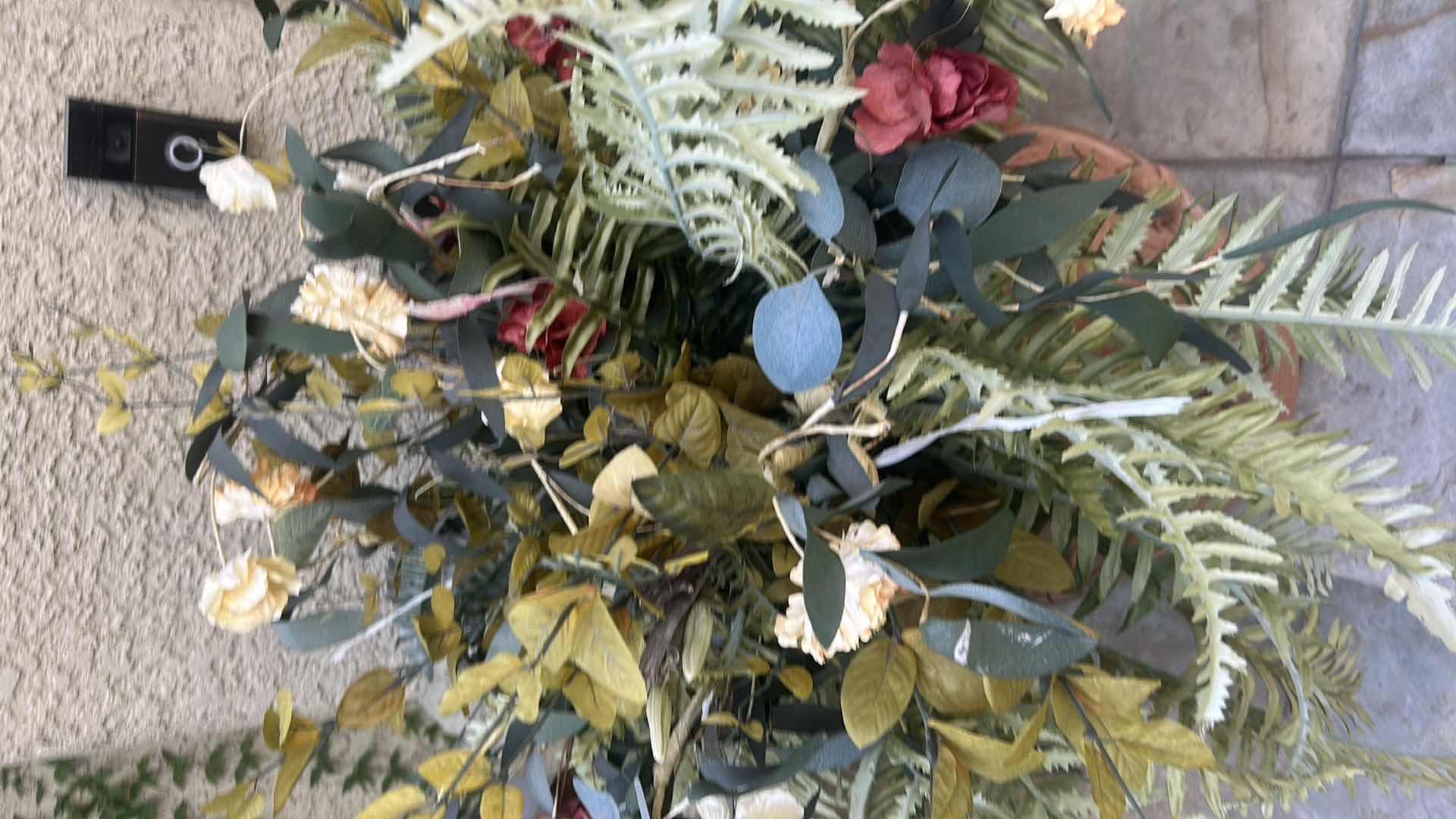 Photo 1 of ARTIFICIAL BOSTON FERN IN A CARVED TERRACOTTA URN H 43"
