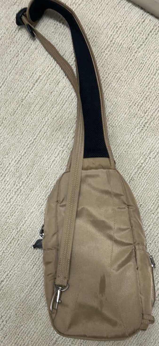 Photo 1 of TRAVELON ANTI THEFT CLASSIC SLING BAG TAUPE W SLASH RESISTANT MESH PANELS
