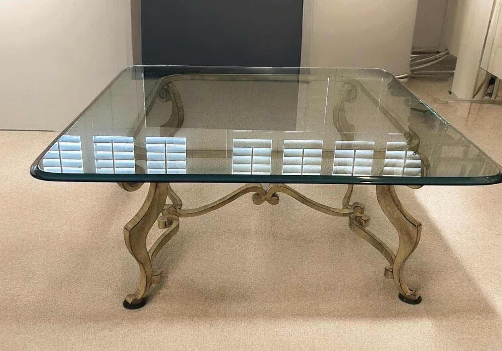 Photo 1 of COFFEE TABLE W HOLLYWOOD REGENCY STYLE DESIGN W BEVELED GLASS TOP & GILDED WROUGHT IRON BASE 39" X 39" H 17"