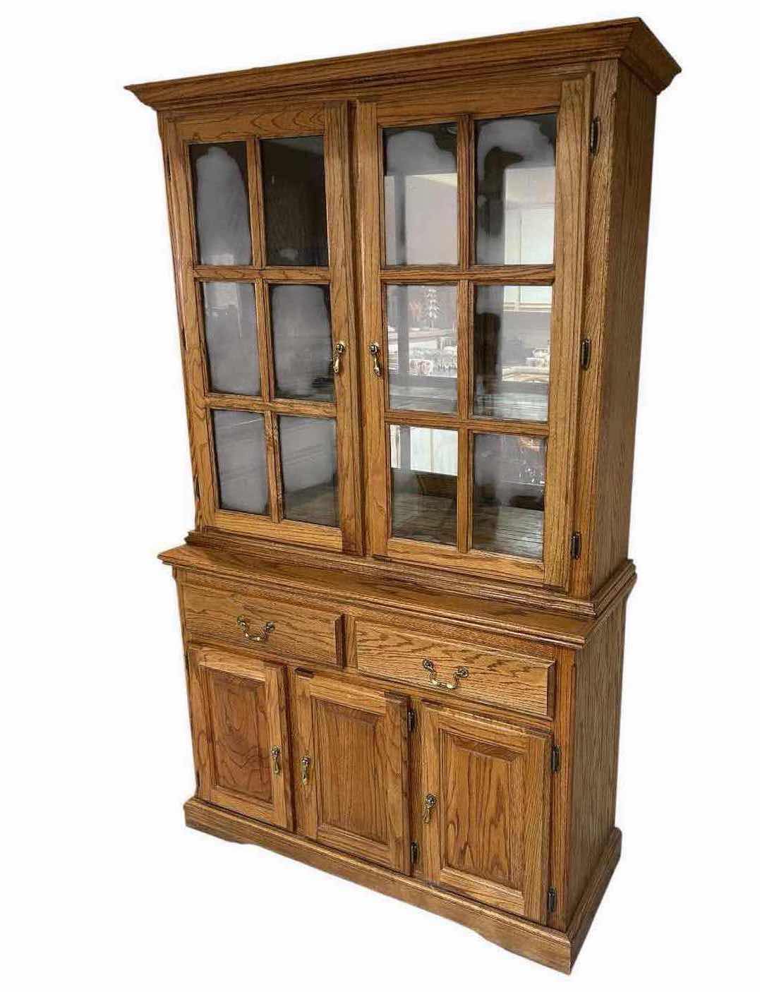Photo 1 of TRADITIONAL TWO PIECE OAK CABINET HUTCH W GLASS UPPER  DOORS & LOWER BUFFET 46" X 17" H 76"