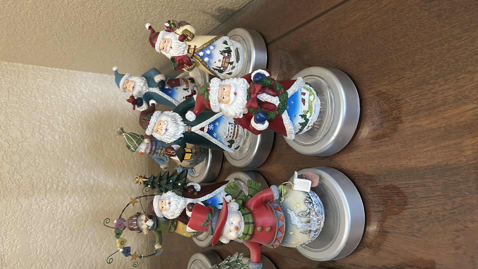 Photo 1 of COLLECTION OF FESTIVE HOLIDAY SNOWMEN SANTAS ANGEL W LIGHT UP BASES H 6"