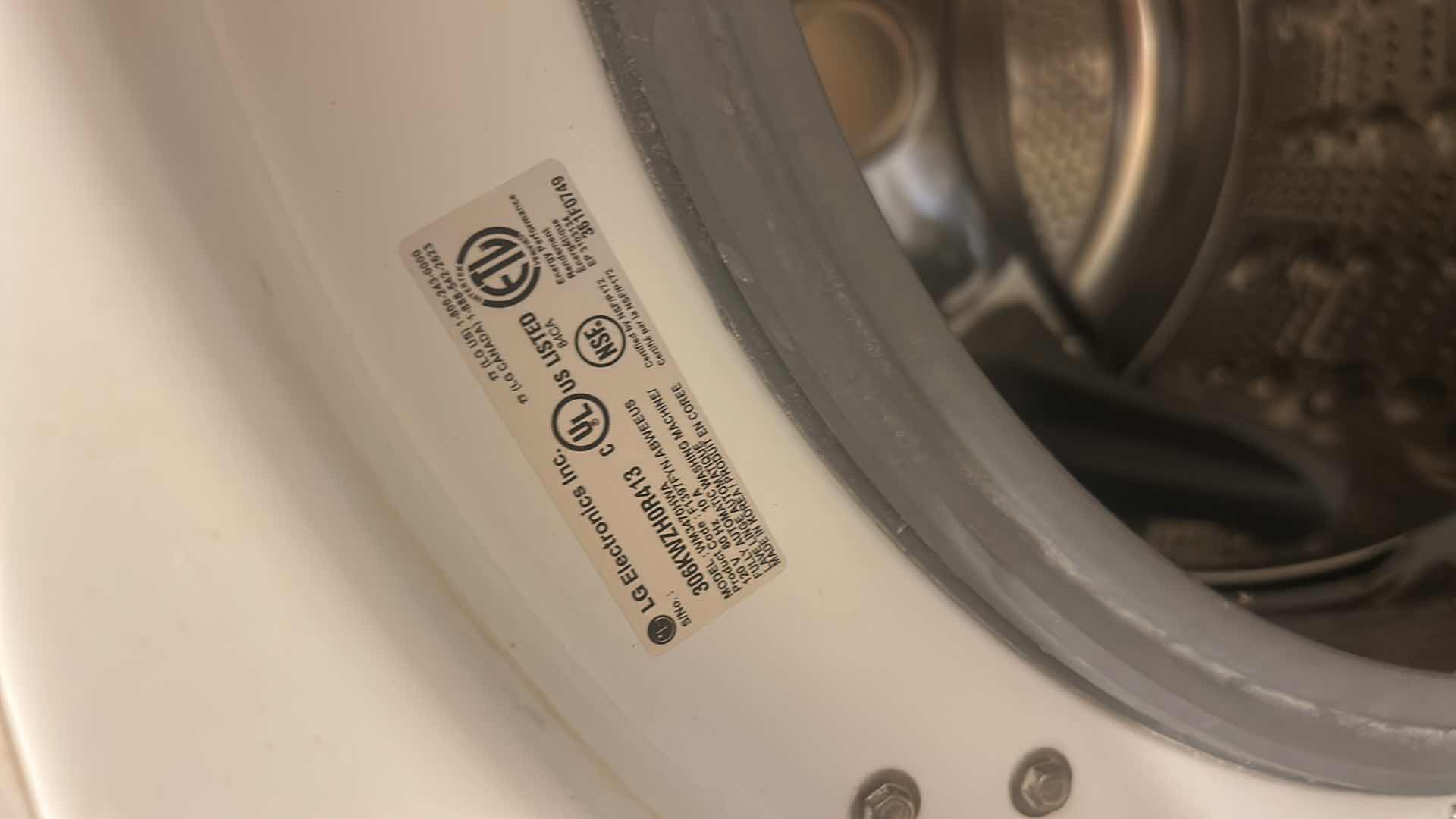 Photo 1 of WHITE LG FRONT LOAD WASHER STEAM CYCLE