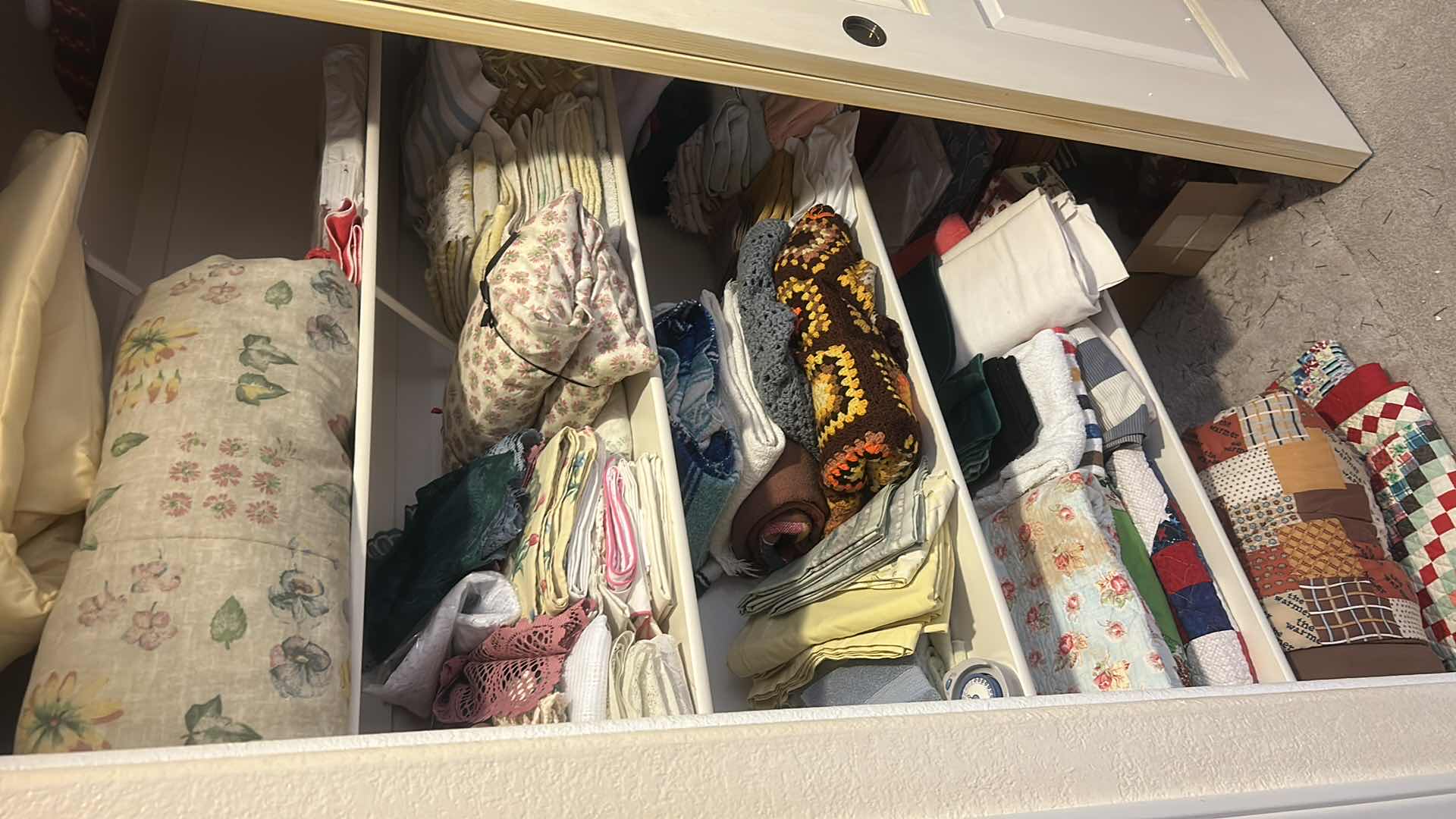 Photo 1 of CONTENTS OF CLOSET LINENS CANDLES QUILTS
