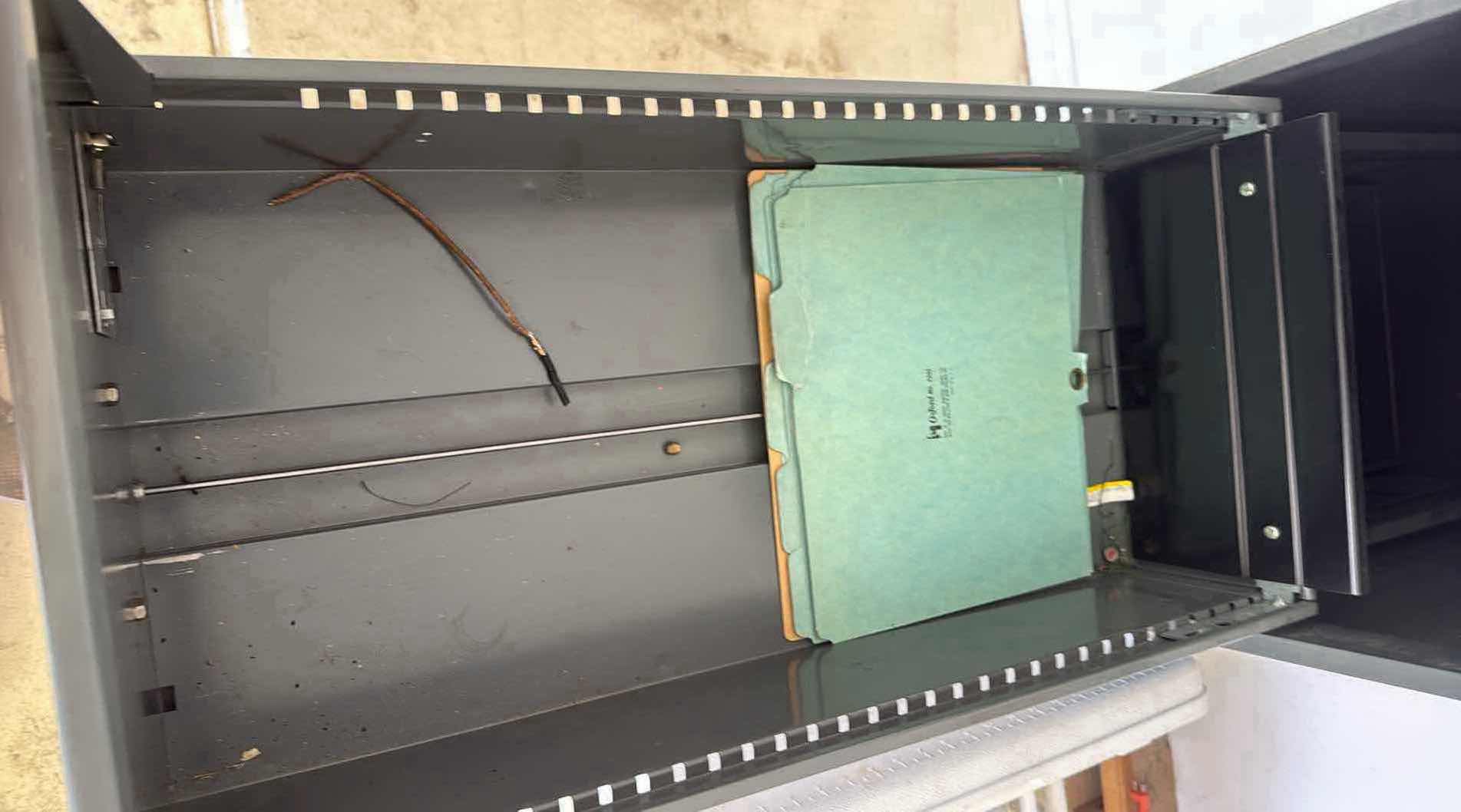 Photo 1 of FILE CABINET 4 DRAWER GRAY H52” W15”