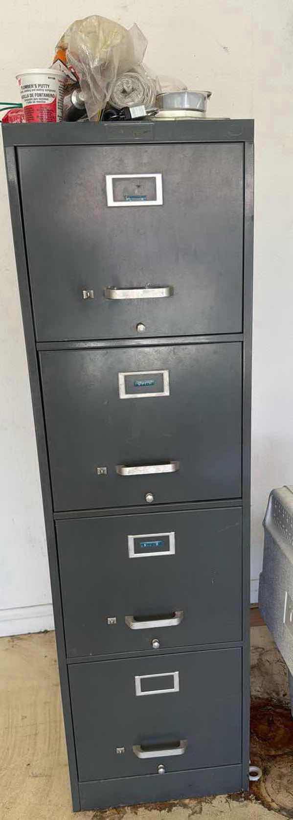 Photo 1 of FILE CABINET 4 DRAWER GRAY H52” W15”