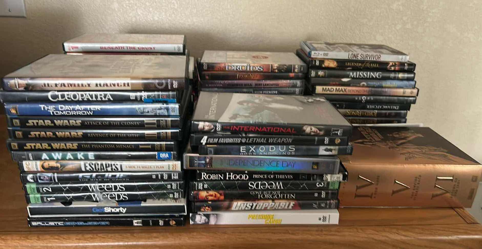 Photo 1 of ASSORTMENT OF DVDS MOVIES