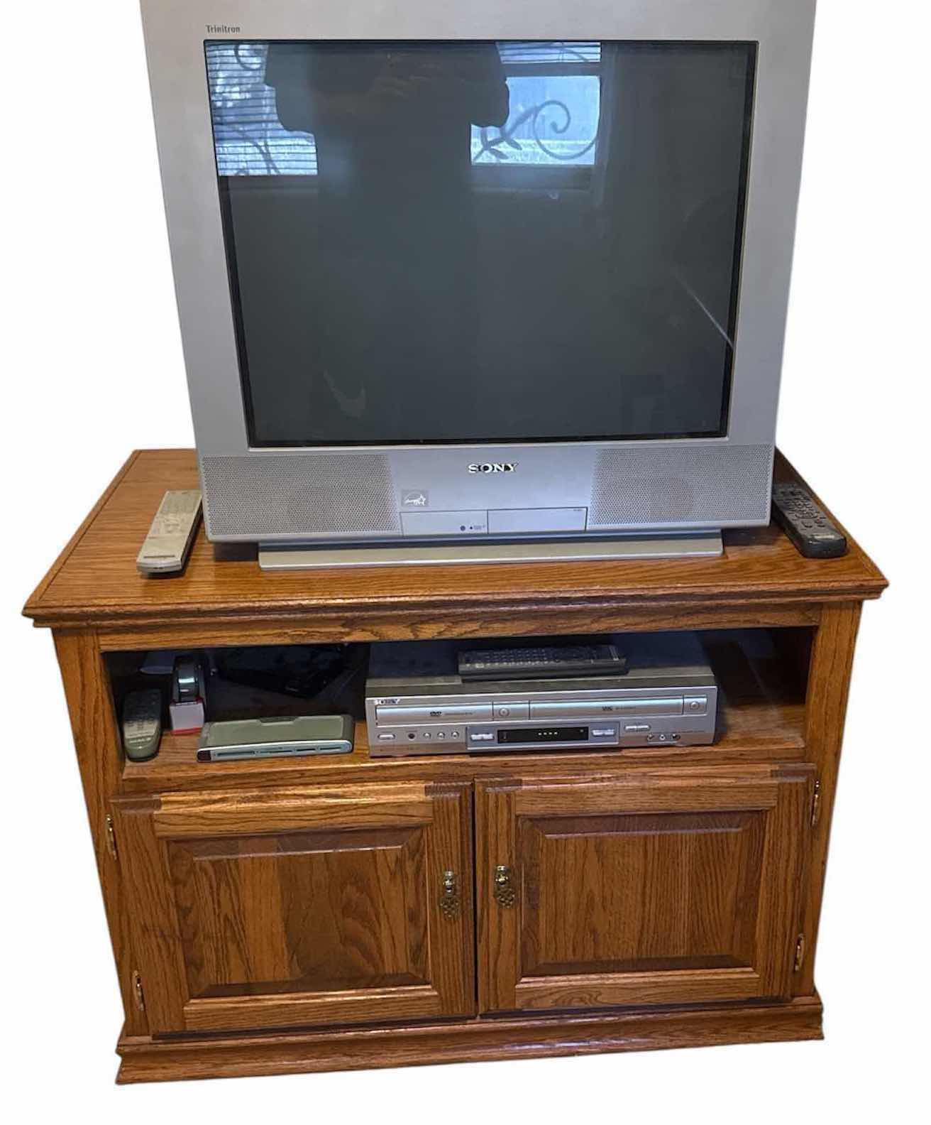 Photo 1 of SONY TV W DVD/VCR COMBO/ TV STAND/ BOOKS 38X22 H29”