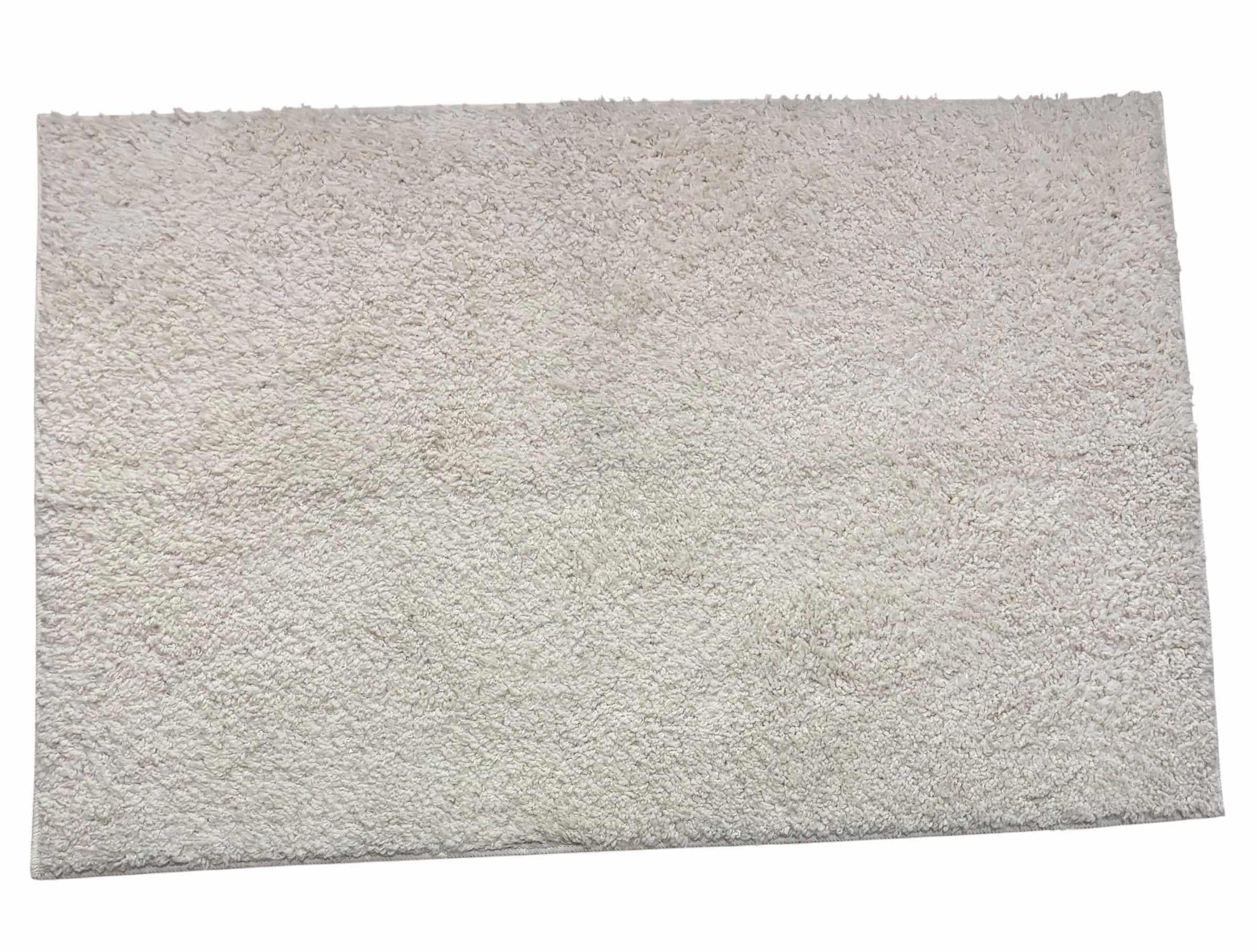 Photo 1 of TWO OFF WHITE RUGS: 4’ X 6’ & 30” X 46”