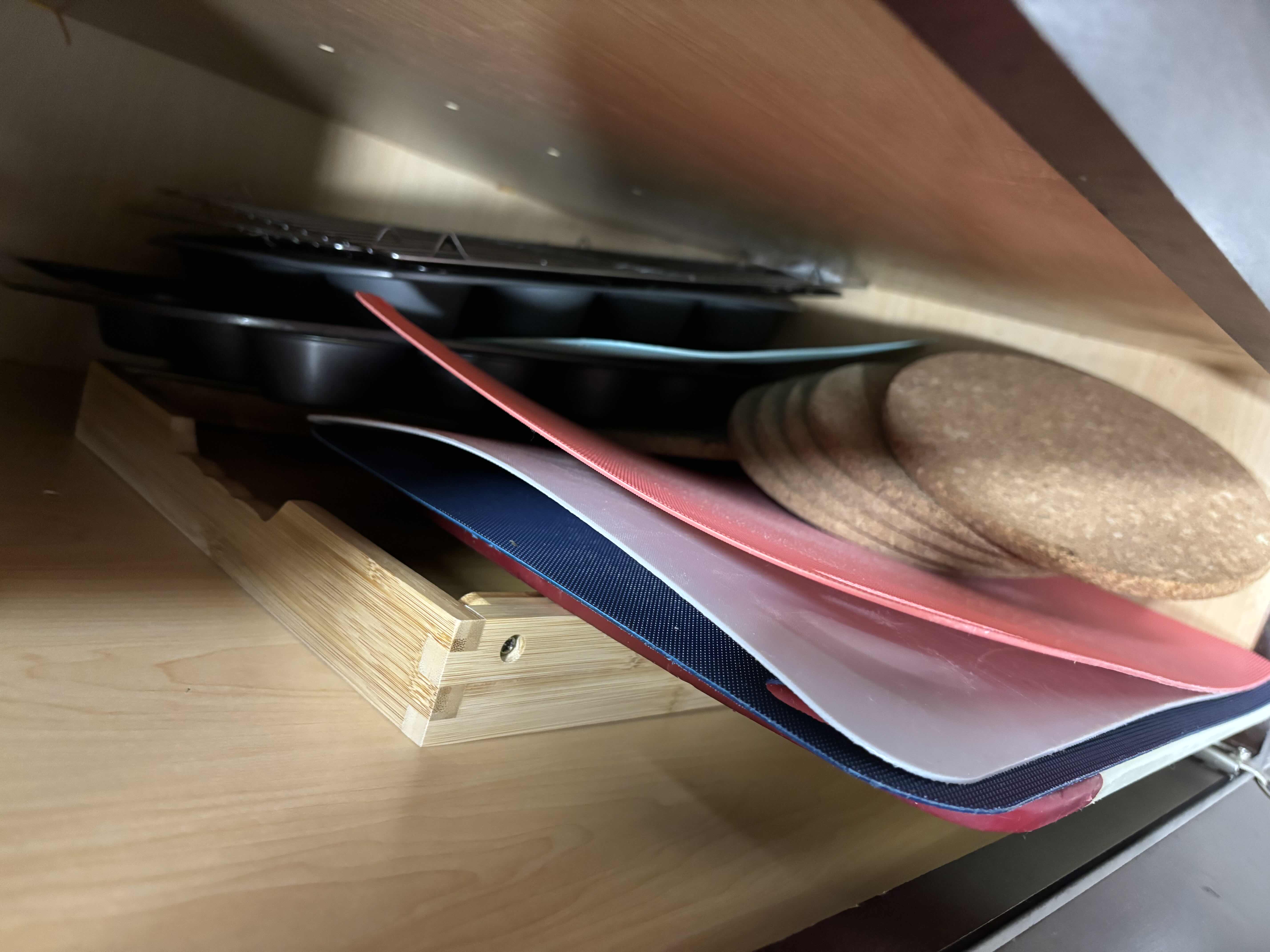 Photo 1 of CONTENTS OF SLENDER KITCHEN CABINET: MUFFIN PANS